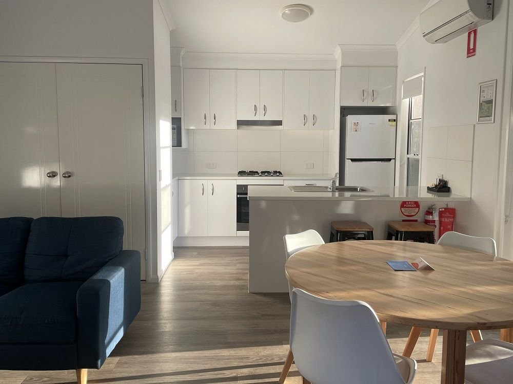Discovery Parks Byron Bay-guestroom-Dlx 2BR Cabin Slps 4 (1669) - Dining Area.jpg
