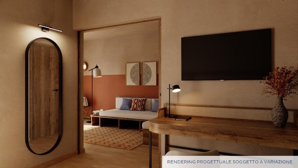 CALASERENA RESORT-guestroom-Suite.jpg