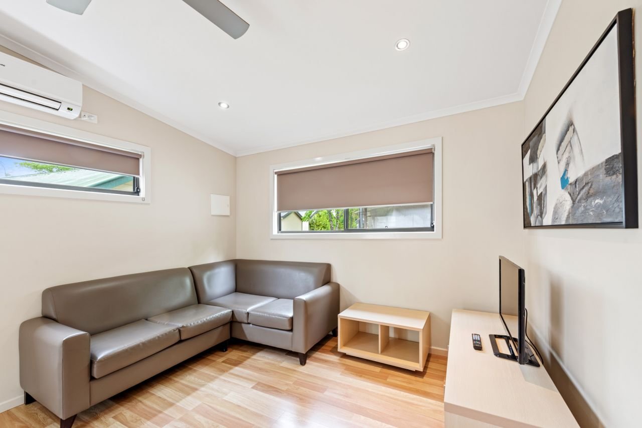DISCOVERY PARKS - LAKE HUME VC-guestroom-Dlx 2BR Cabin Slps 6 (1317) - Living Area.jpg