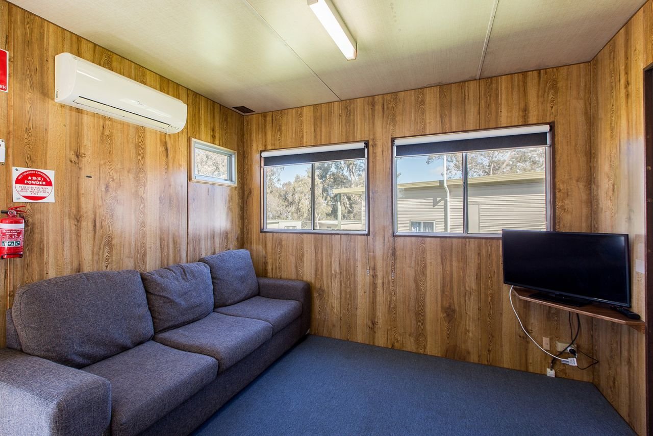 Discovery Parks - Lake Hume-guestroom-Economy 2BR Cabin Slps 4 (2050) - Living Area.jpg