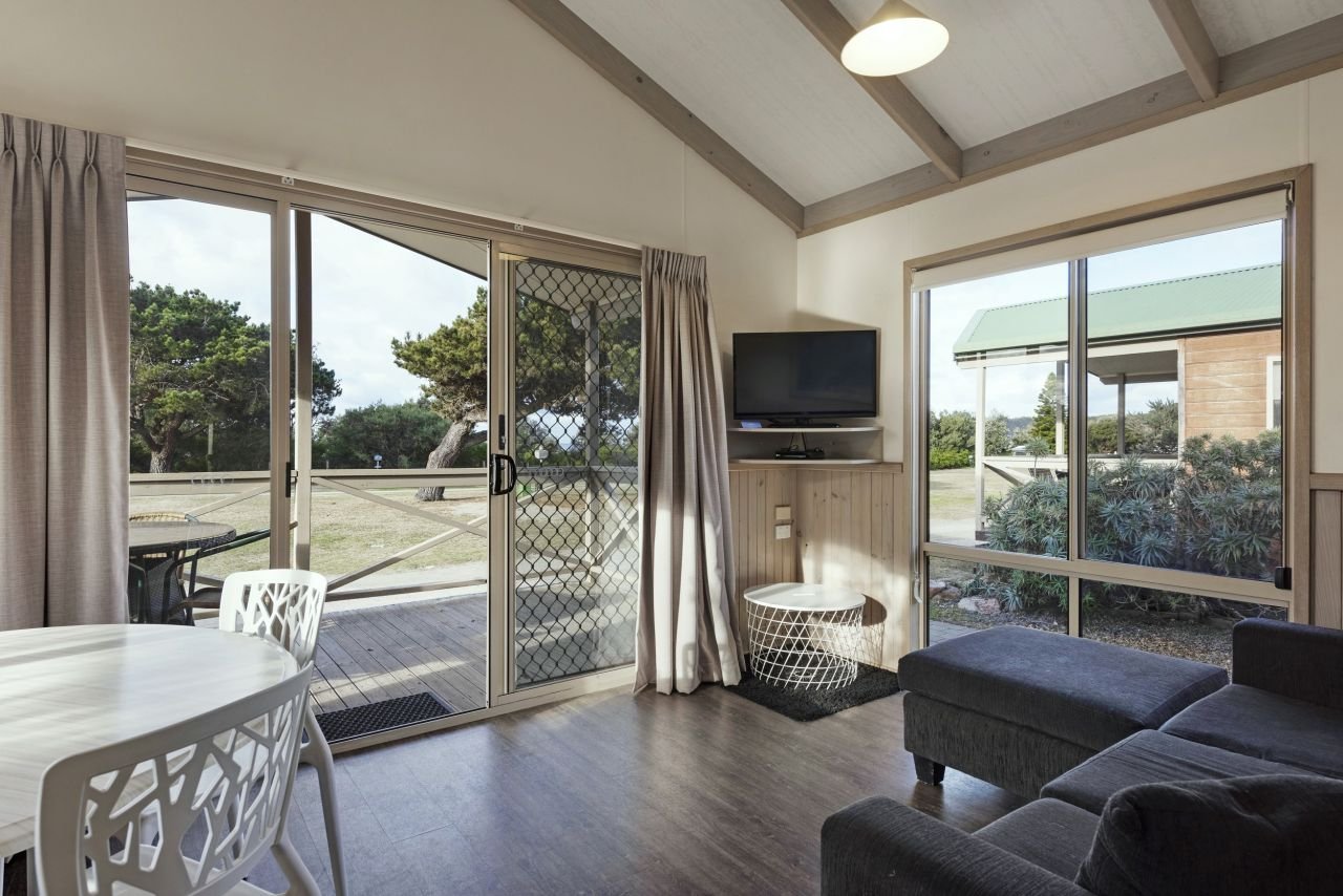 DISCOVERY PARKS - PAMBULA-guestroom-Dlx 2BR Cabin Slps 5 (737) - Living Area.jpg