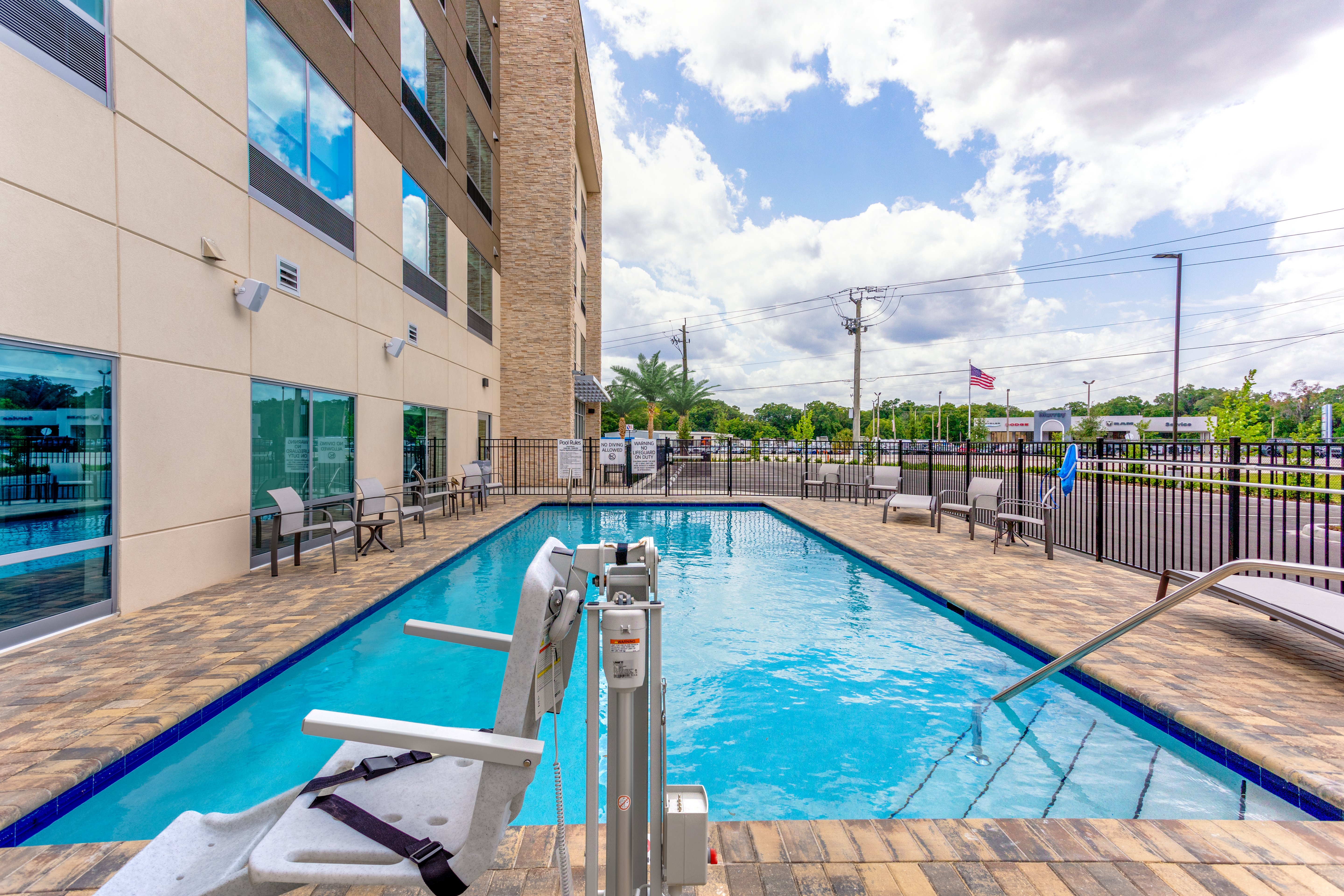 HOLIDAY INN EXP STARKE BY IHG-guestroom-Accessible Access to Pool.jpg