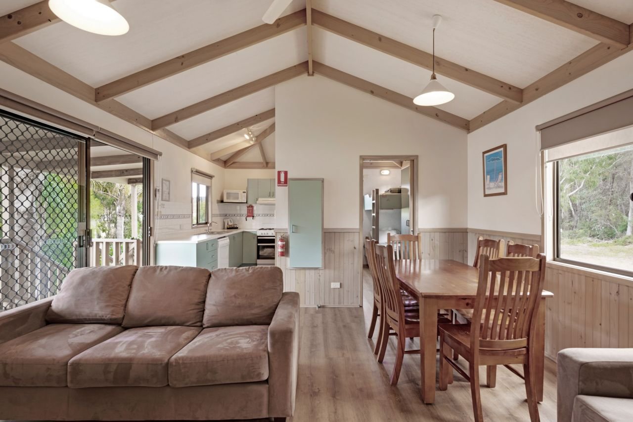 DISCOVERY PARKS - EDEN-guestroom-Dlx 2BR Cabin (1561) - Dining Area.jpg