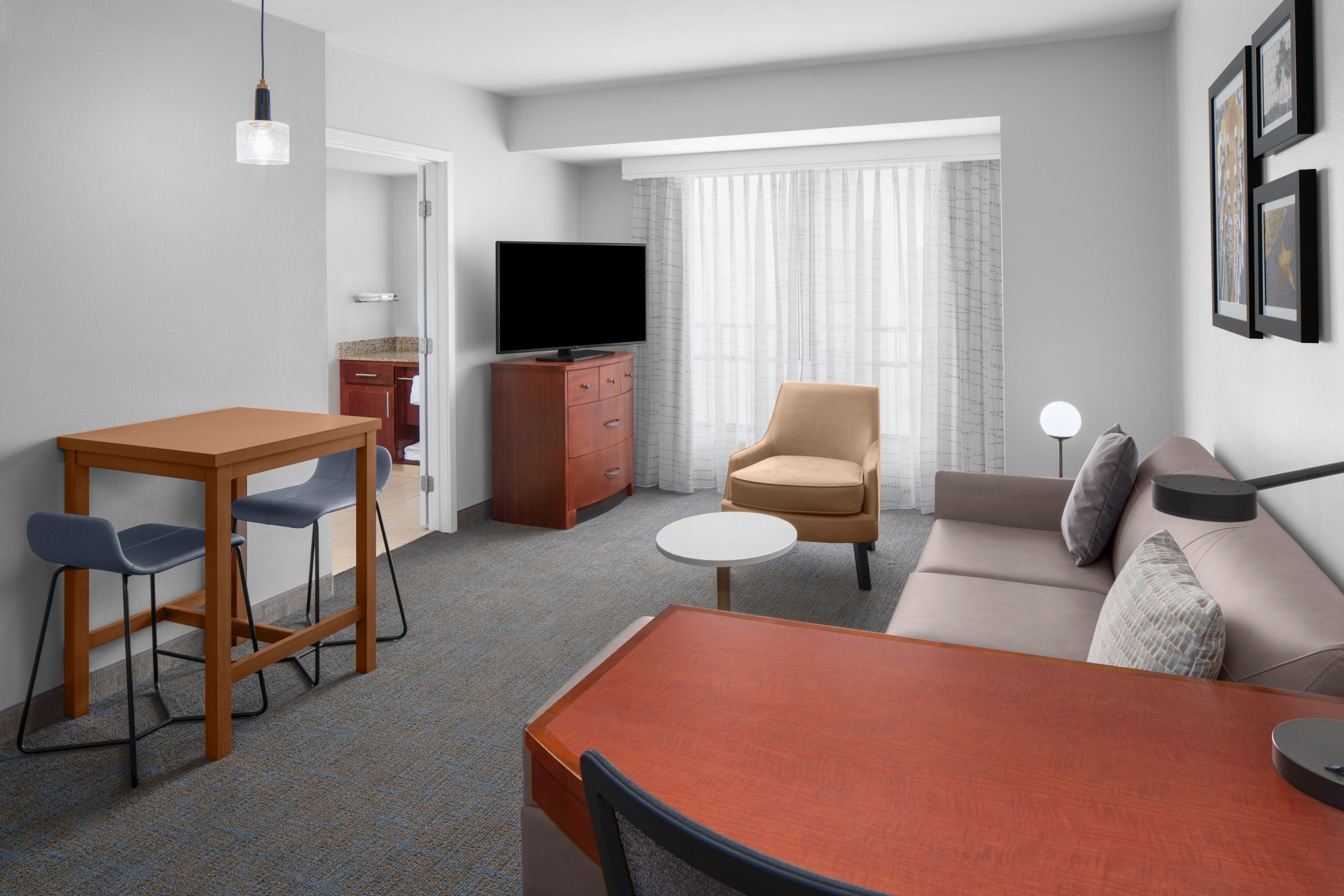 Residence Inn by Marriott Los Angeles Burbank Downtown-guestroom-One-Bedroom King Suite - Living Area.jpg