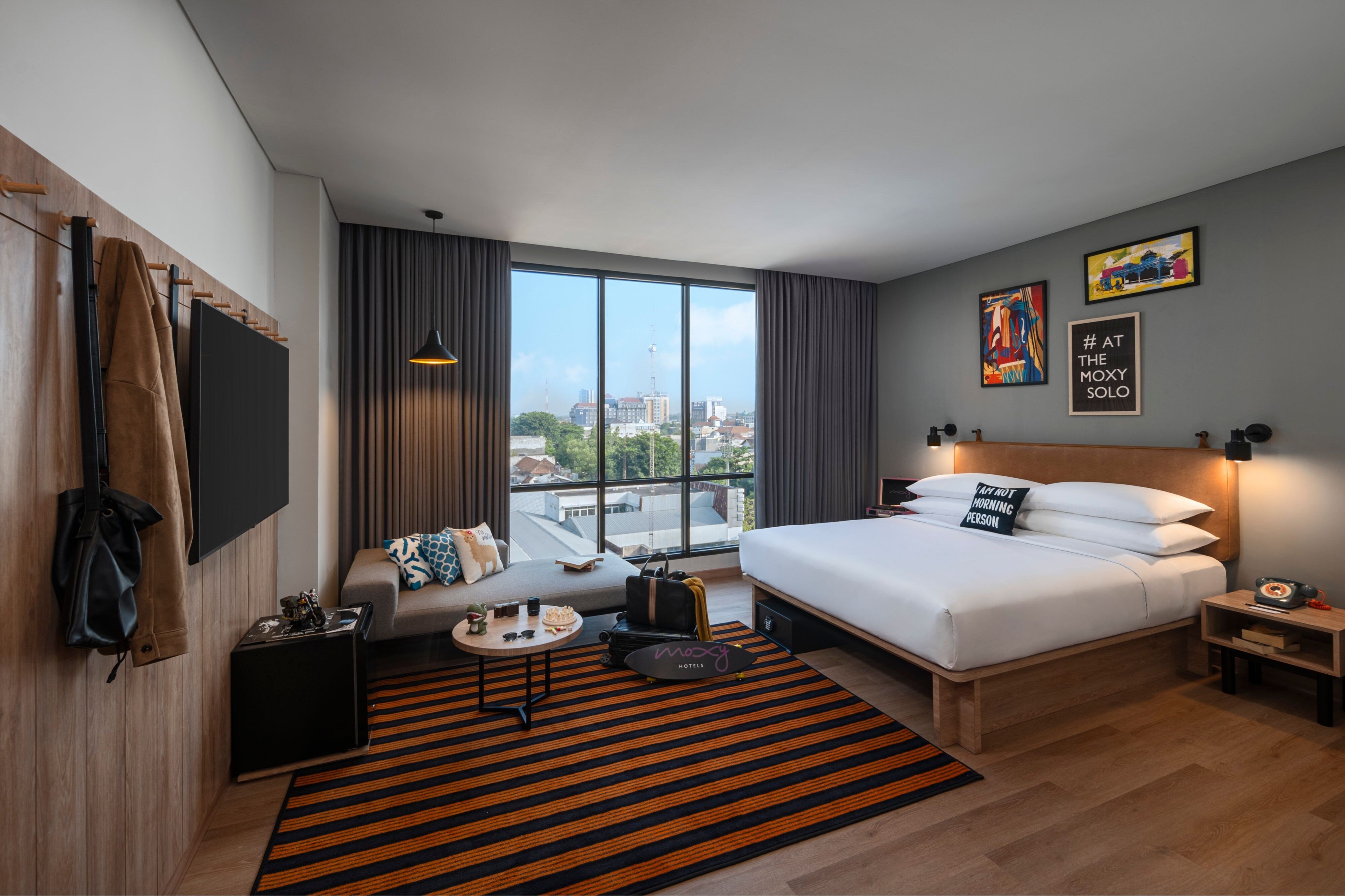 Moxy Solo-guestroom-Moxy Deluxe Room.jpg