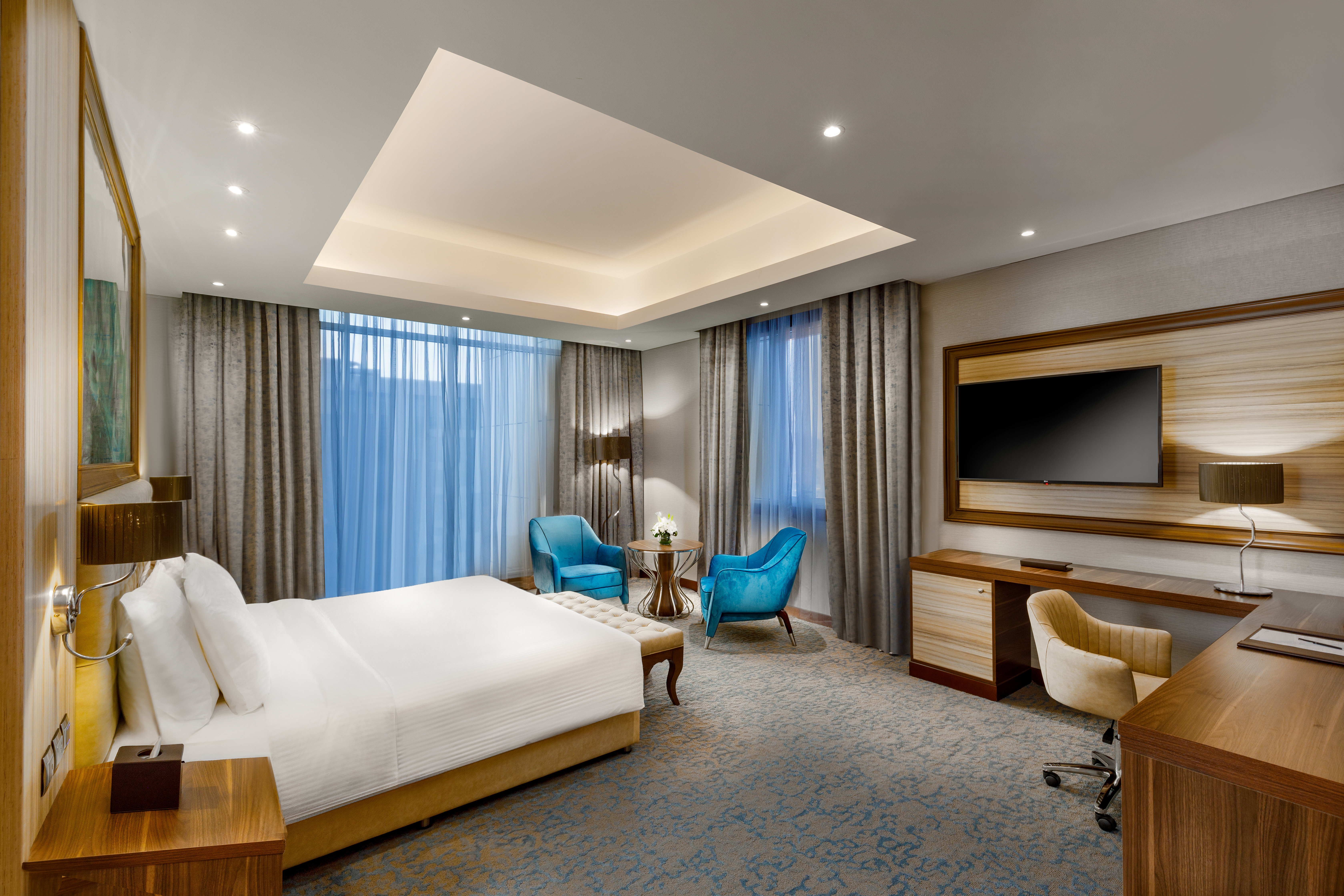 Millennium Place Doha-guestroom-Executive Suite Bedroom.jpg