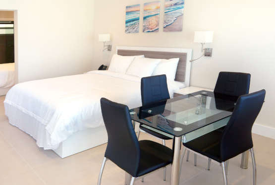 THE DIANE OCEANFRONT SUITES-guestroom-Bedroom.jpg