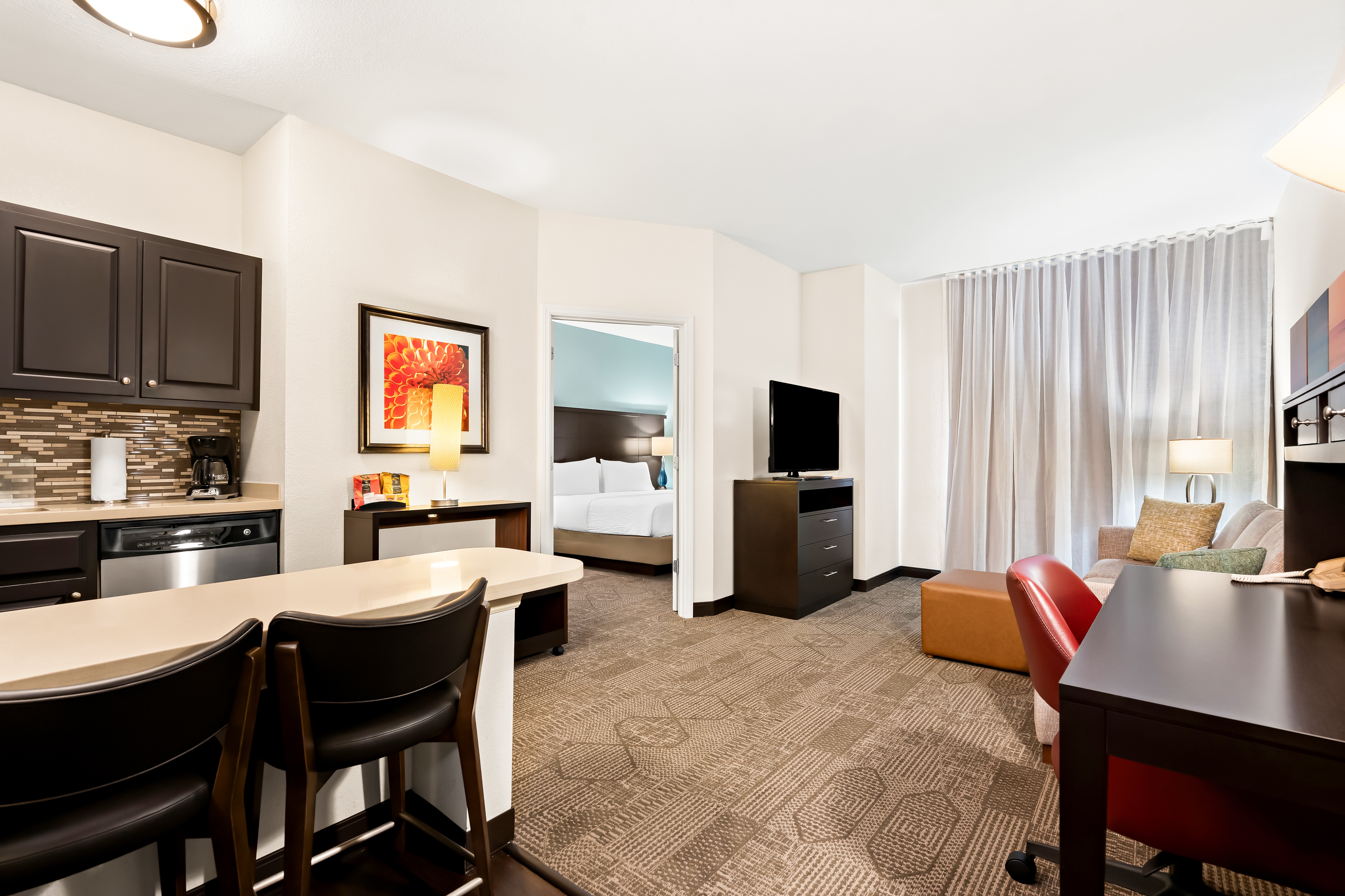 STAYBRIDGE SUITES WEST CHESTER BY I-guestroom-Suite.jpg