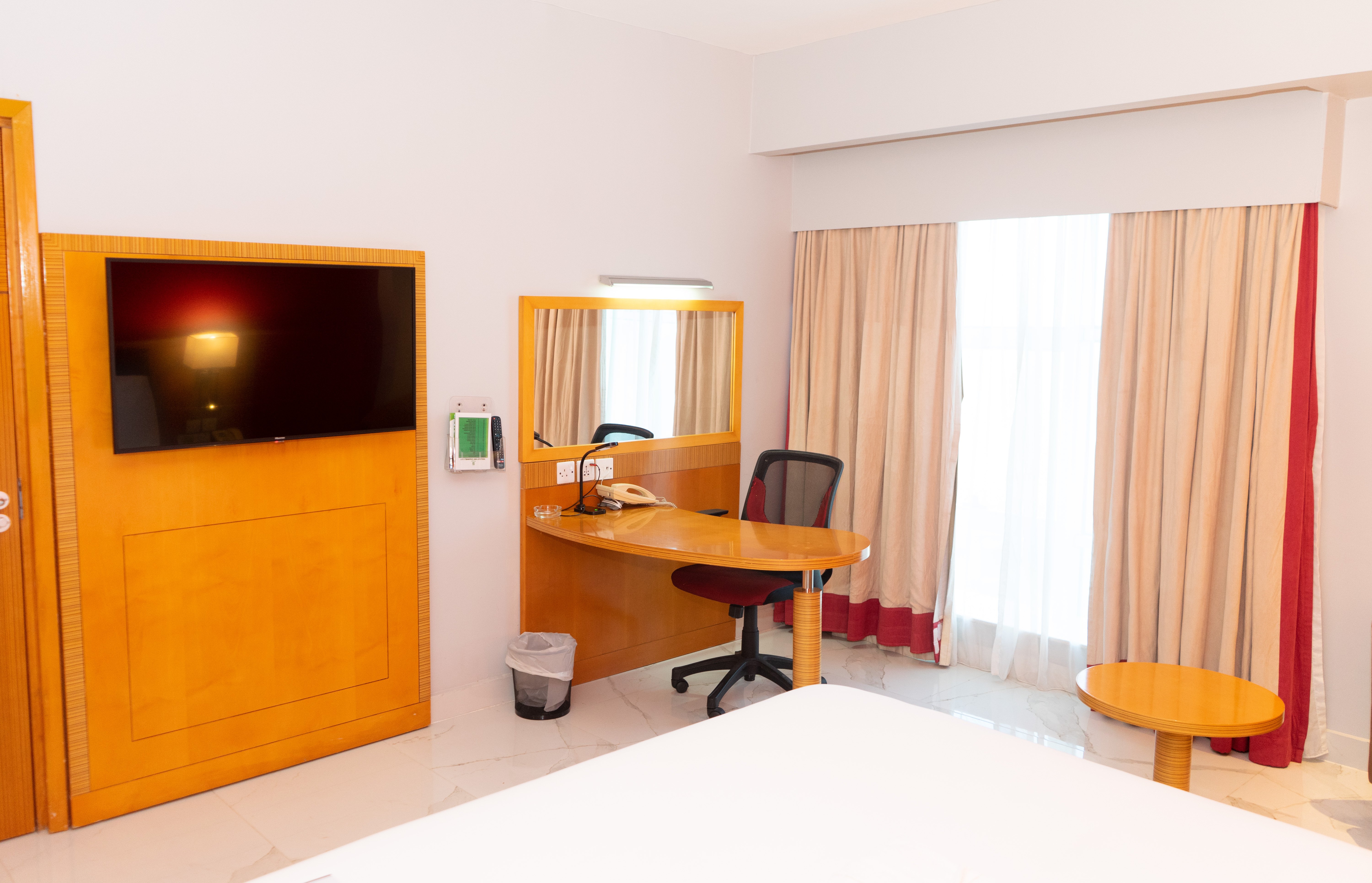 HOLIDAY INN DAR ES SALAAM MAWE BY I-guestroom-Room Feature.jpg
