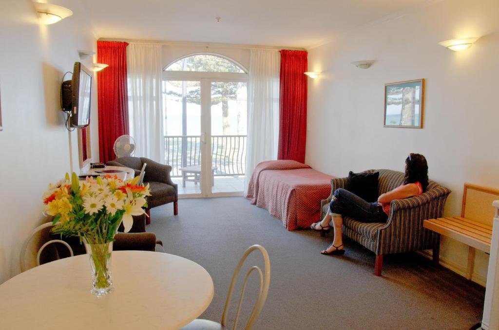 Beach Front Motel-guestroom-Beachfront Motel Sea Facing BR Suite Living Room.jpg