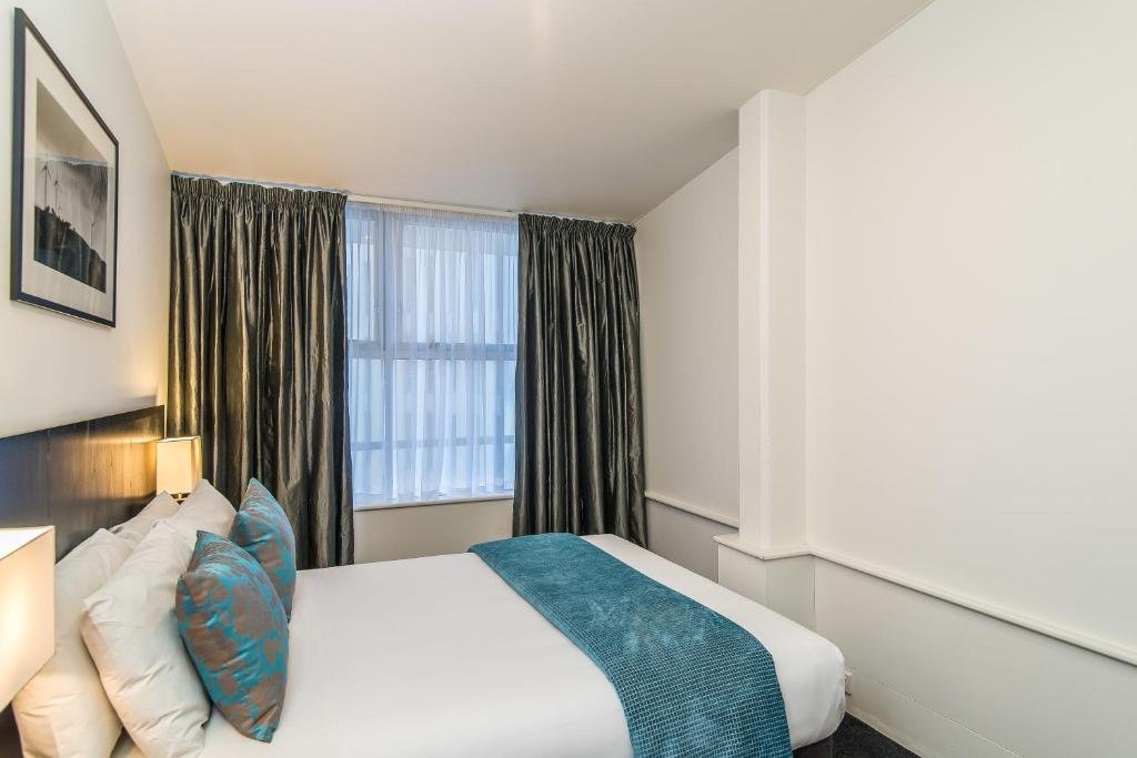 Gilmer Apartment Hotel-guestroom-Bedroom Apartment.jpg