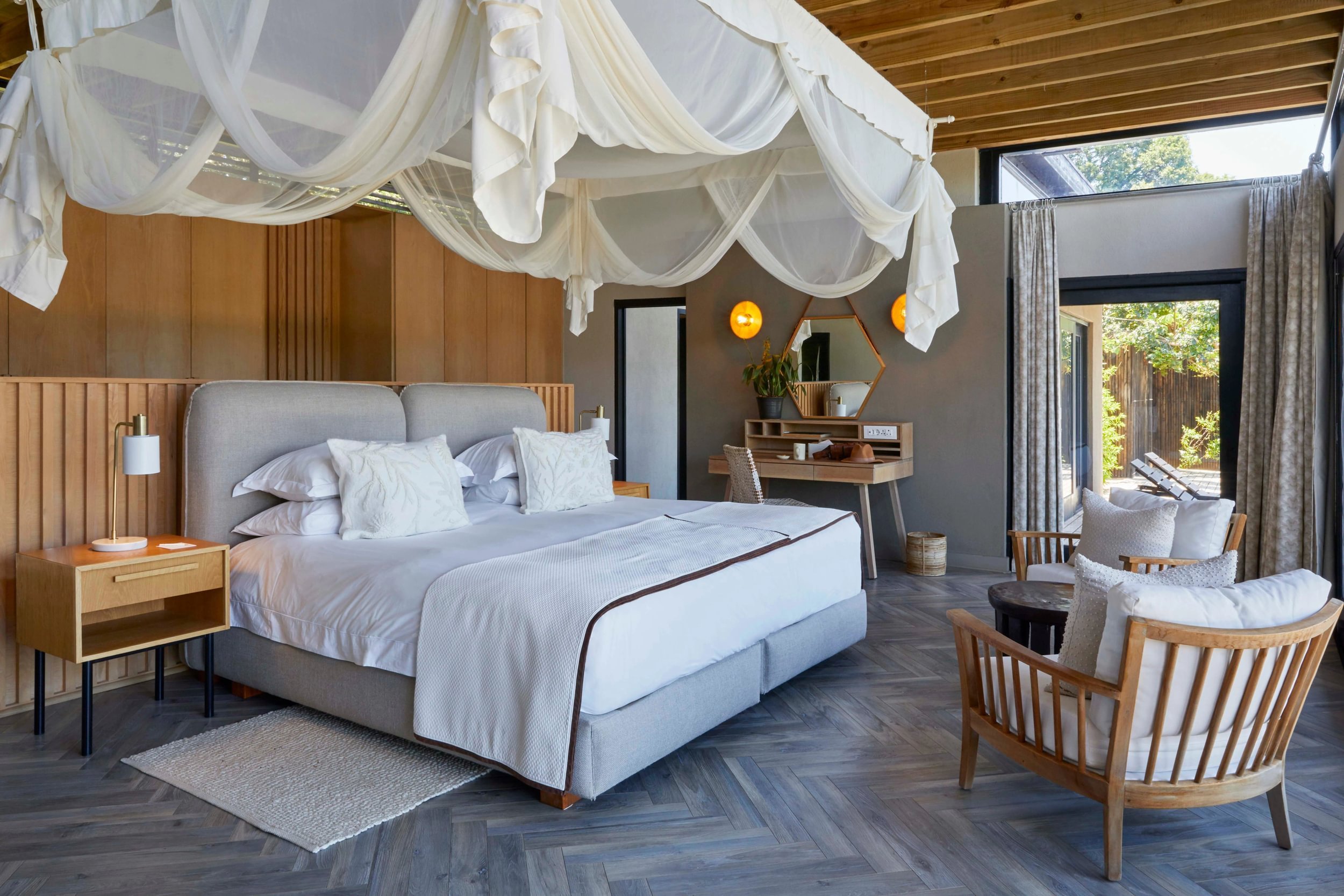 Lion Sands River Lodge-guestroom-Lion Sands River Lodge River Suite Bedroom.jpg