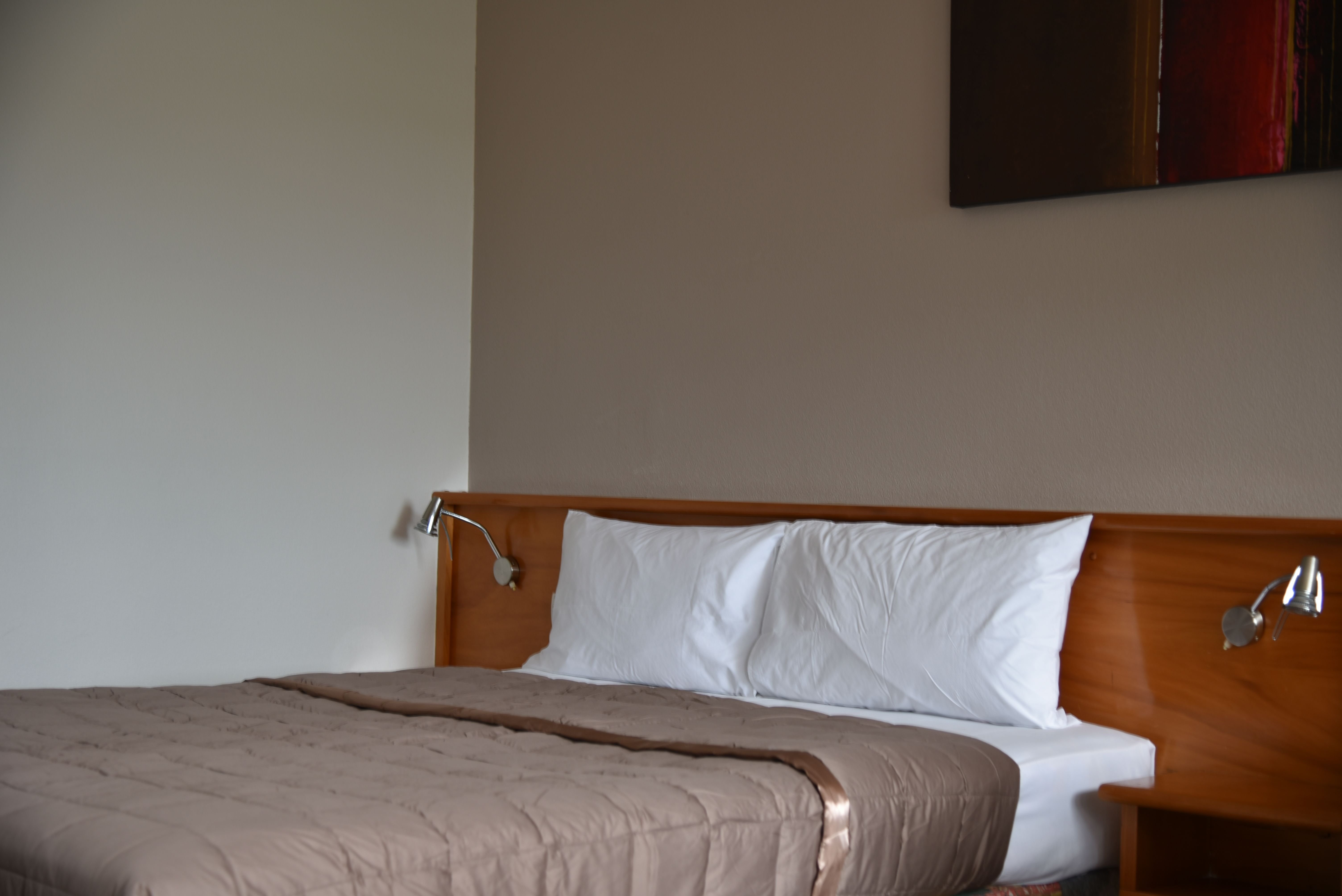 AOTEA LODGE PORIRUA-guestroom-Queen One Bedroom.jpg