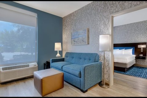 Lotus Orlando Bedroom Lounge Area