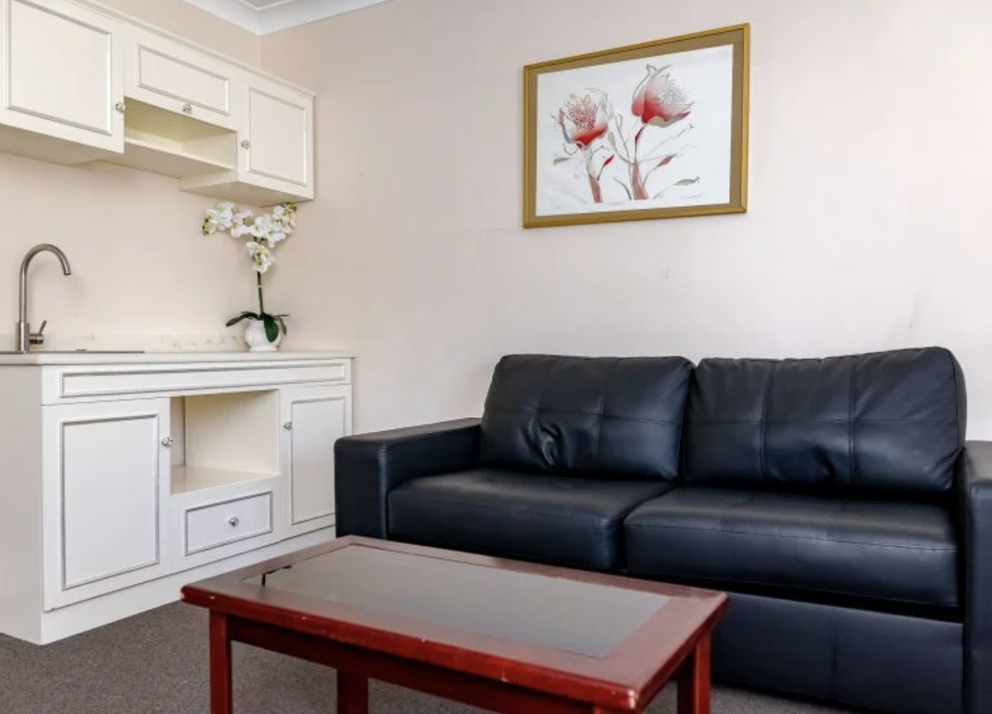 CHARBONNIER SINGLETON-guestroom-KING SUITE Two.jpg