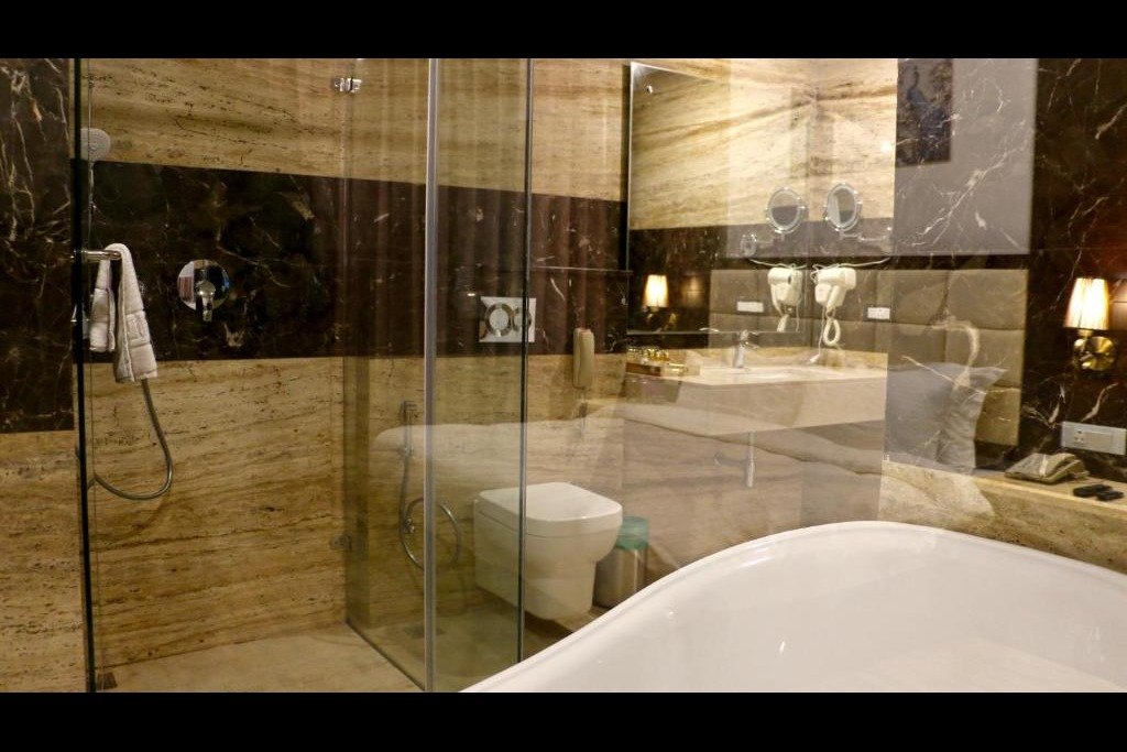 Tiaraa Hotel, Jim Corbett-guestroom-Tiaraa JC Presidential Room Bathroom.jpg