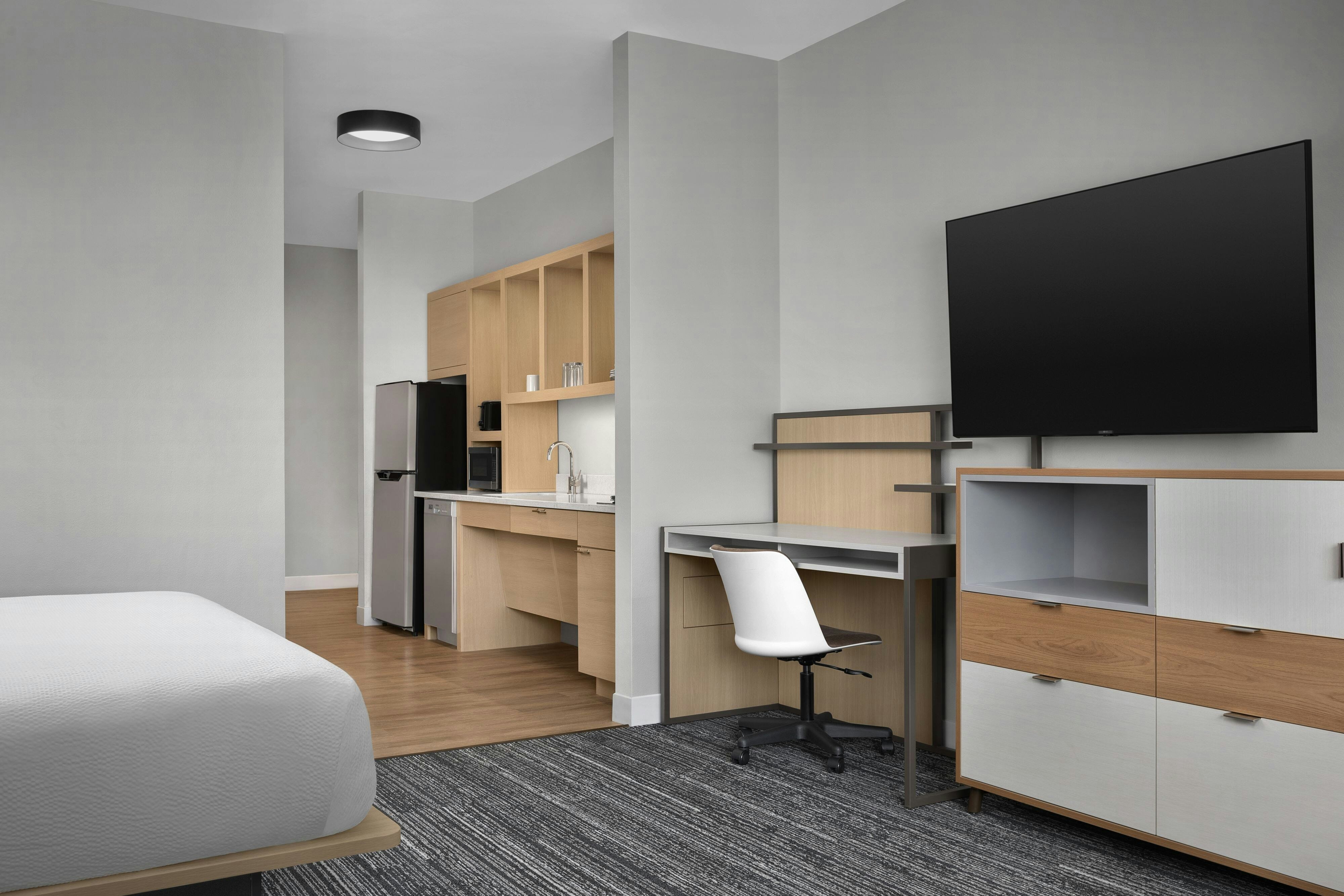 TownePlace Suites by Marriott Sikeston-guestroom-ADA Accessible King Suite Bedroom.jpg