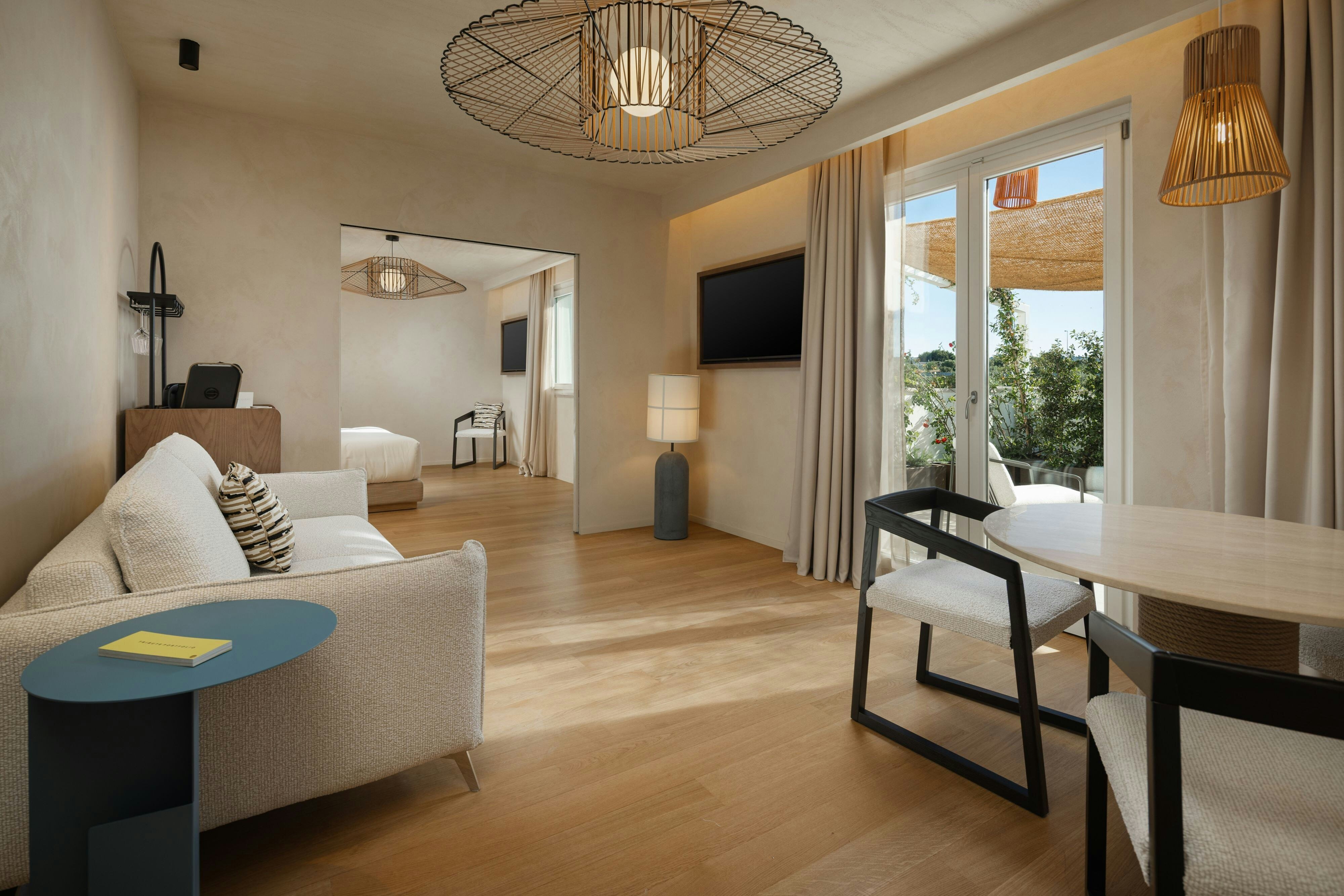 Cala Ponte a Tribute Portfolio Hotel-guestroom-Sofa bed.jpg