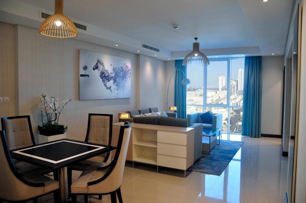 GULF EXECUTIVE RESIDENCE - JUFFAIR-guestroom-Living Area.jpg