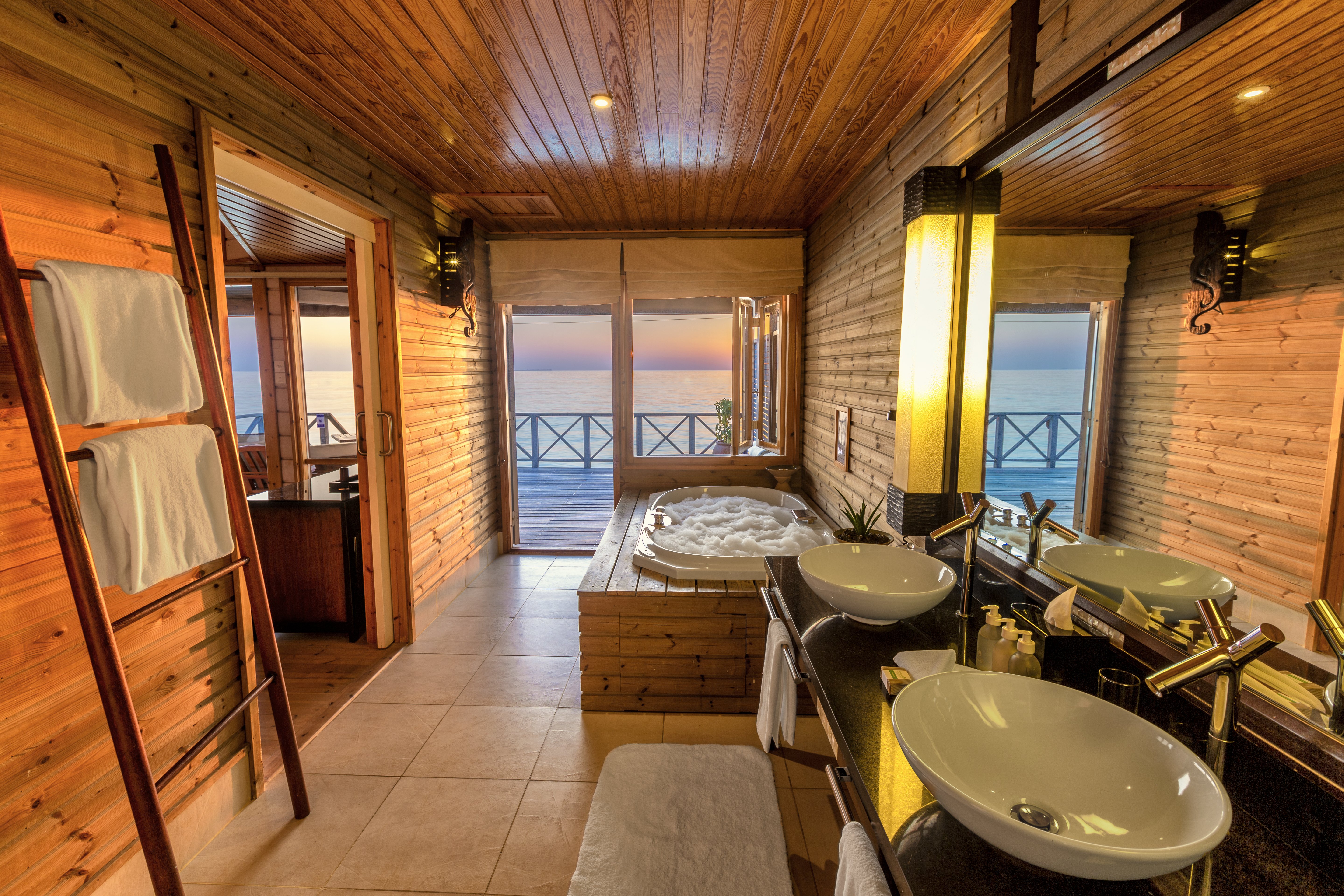 KOMANDOO ISLAND RESORT AND SPA-guestroom-Komandoo Ocean Jacuzz I Water Villas Bathroom.jpg