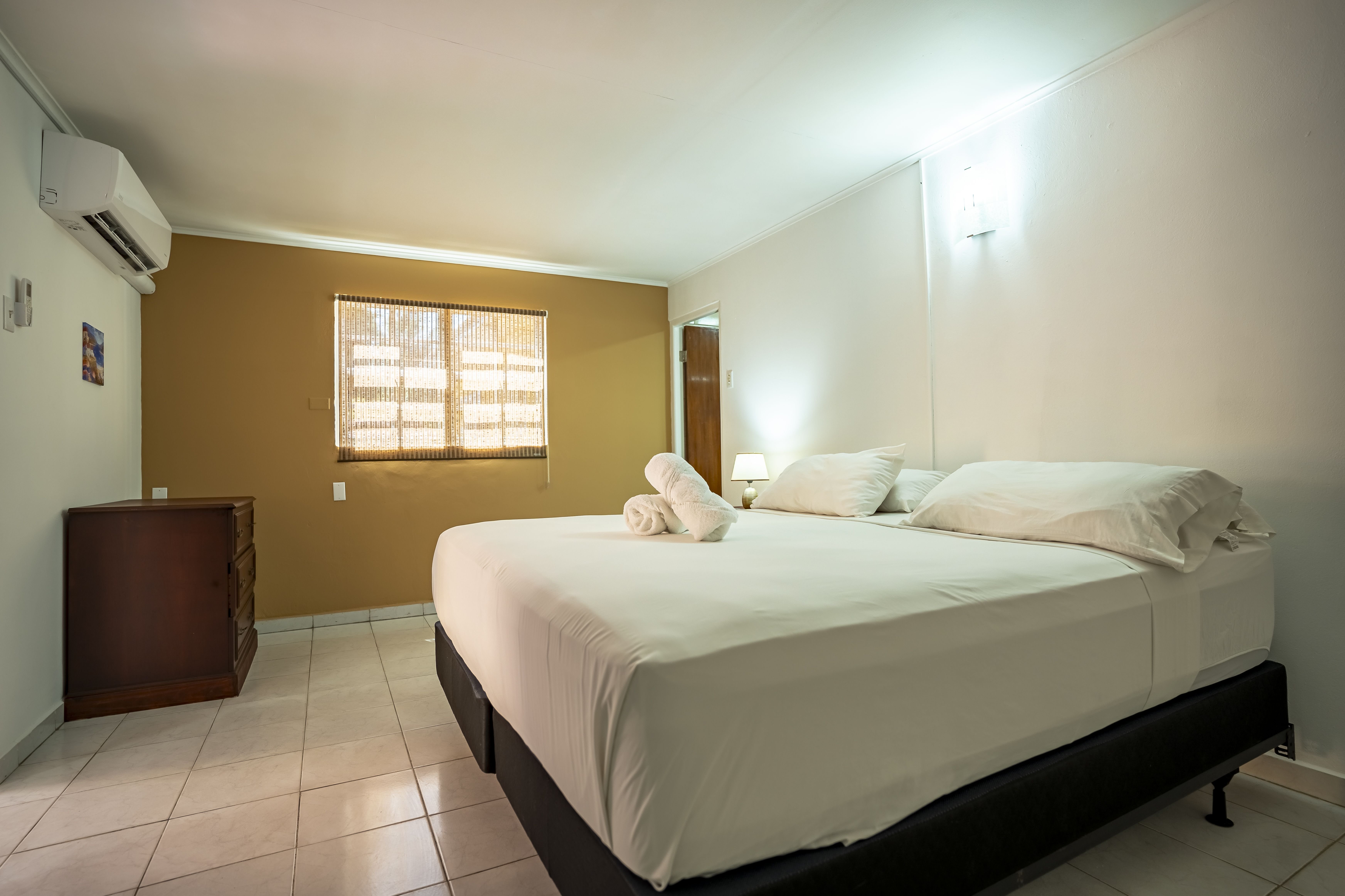 COCONUT INN-guestroom-One Bedroom Queen Apartment.jpg