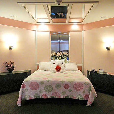 INN OF THE DOVE-guestroom-Bed Area.jpg