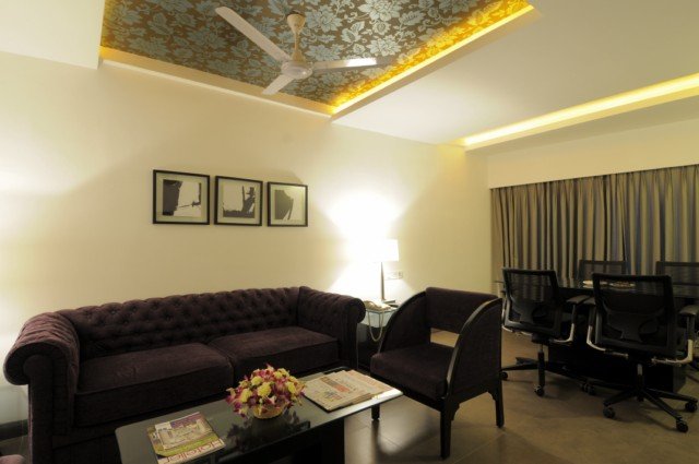 THE CENTRAL COURT HOTEL-guestroom-Business Suite Living Room.jpg