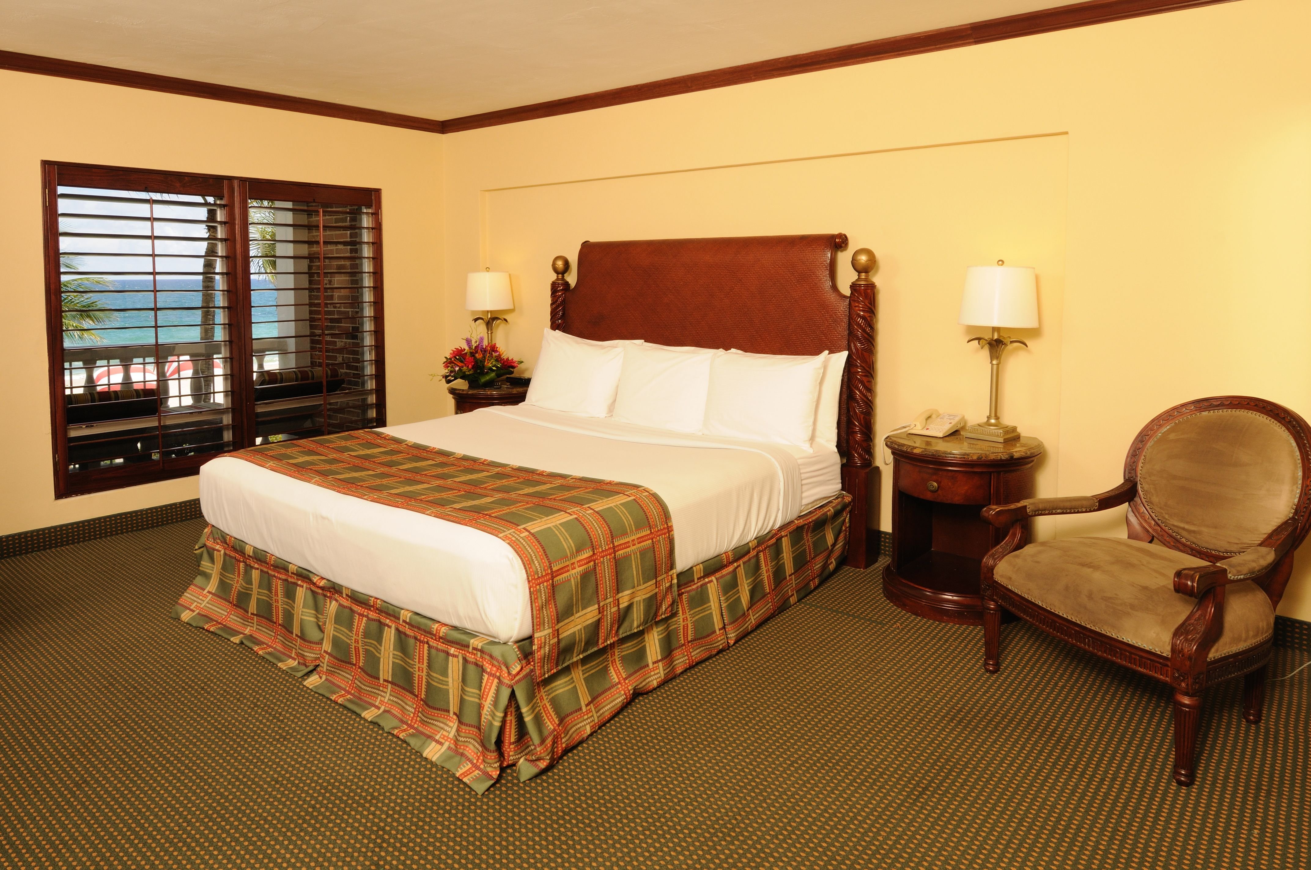 BEACHCOMBER RESORT AND CLUB-guestroom-Ocean front room - 1 king bed with private balcony.jpg
