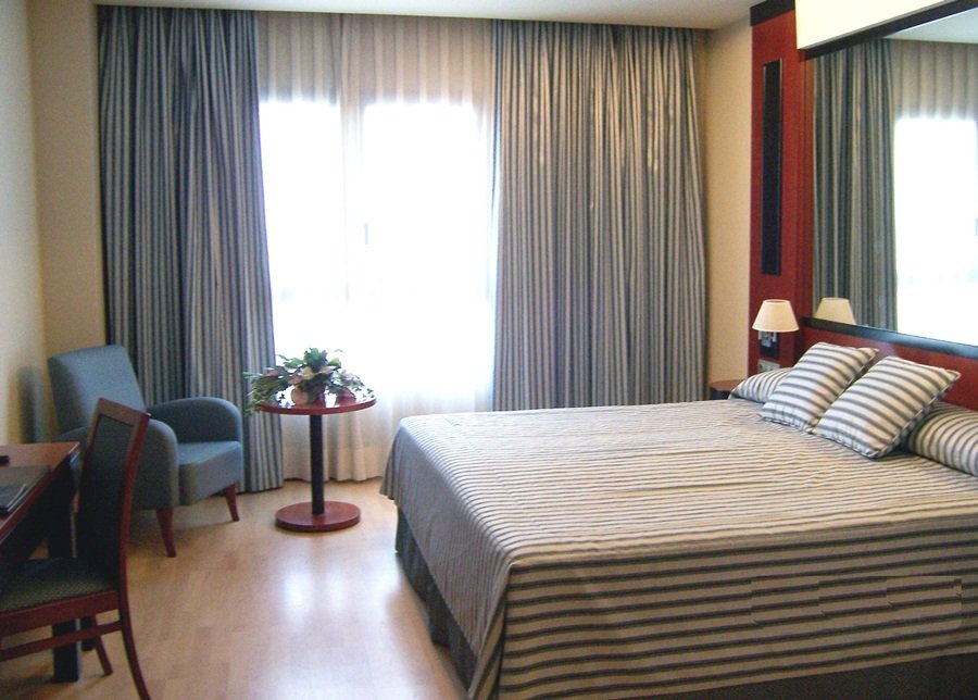 HOTEL OLYMPIA EVENTS-guestroom-601550 Guest Room.jpg