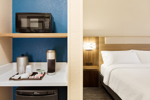Enjoy the in-room coffee maker to start off your day.