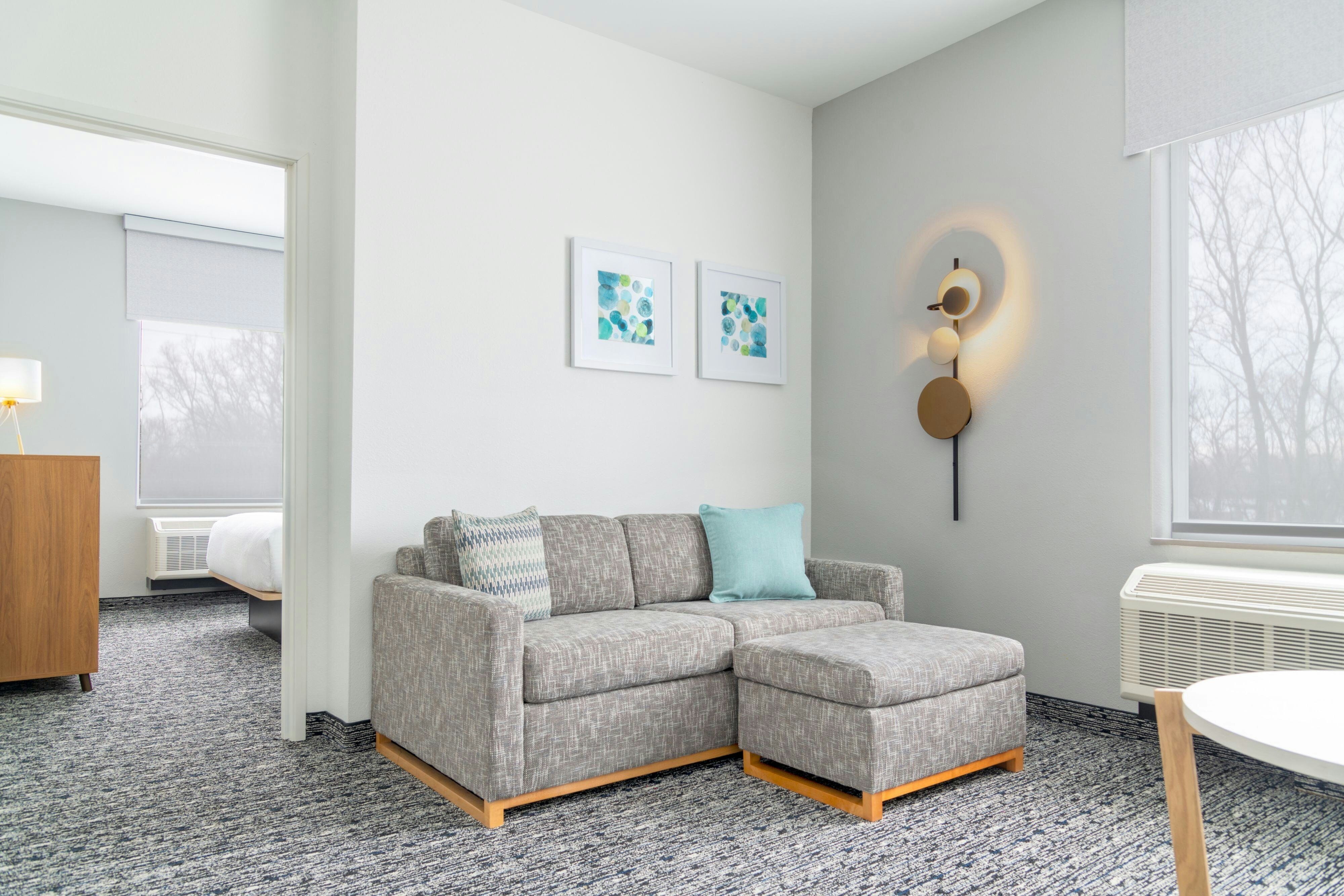 TownePlace Suites by Marriott Holland-guestroom-Living Room.jpg