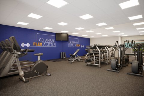 Houston hotel gym with cardio machines, weights, and more.