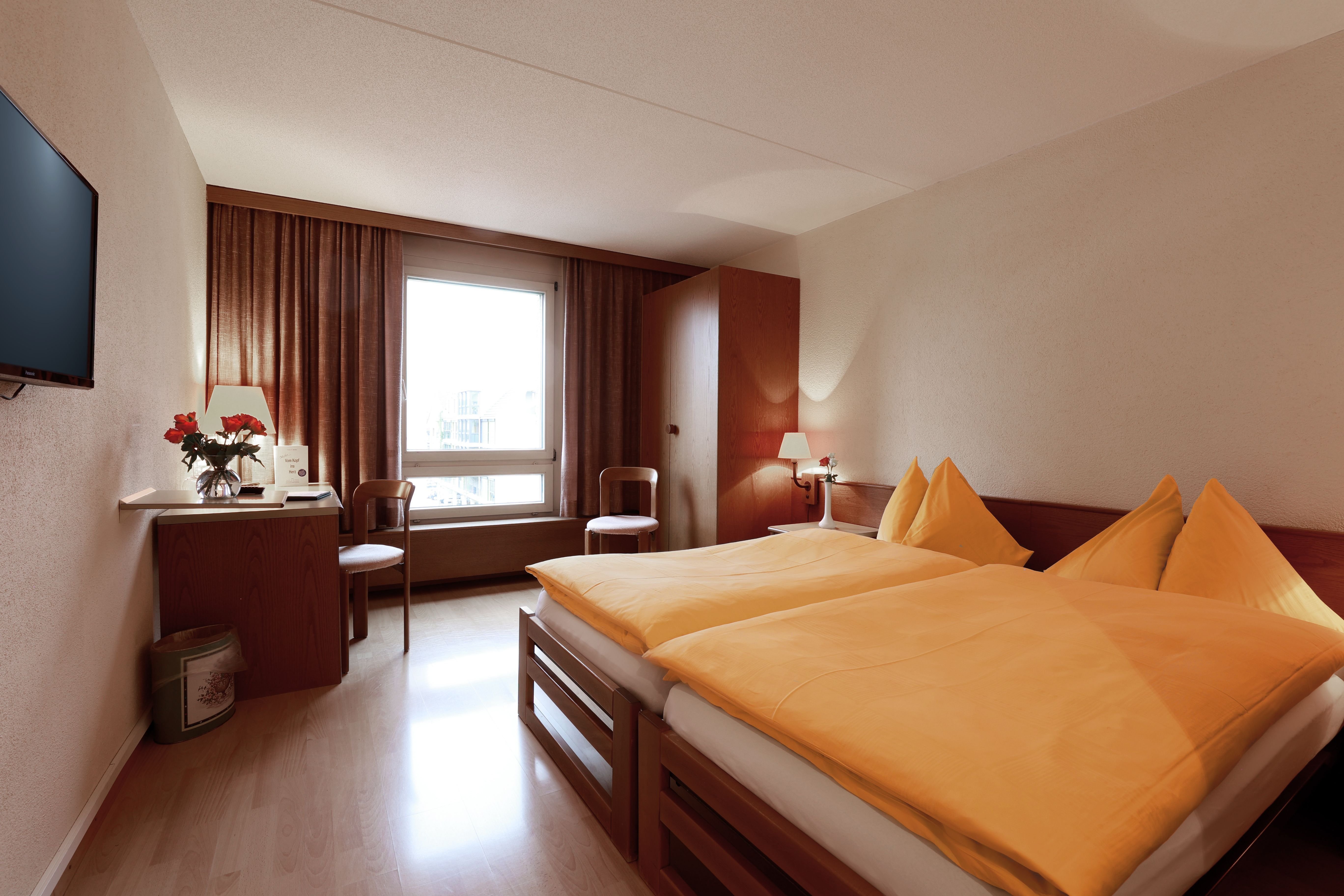 HOTEL THURGAUERHOF SELF CHECK IN-guestroom-Double Room Standard.jpg
