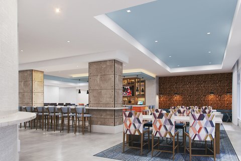 Various seating options during free hot breakfast buffet.