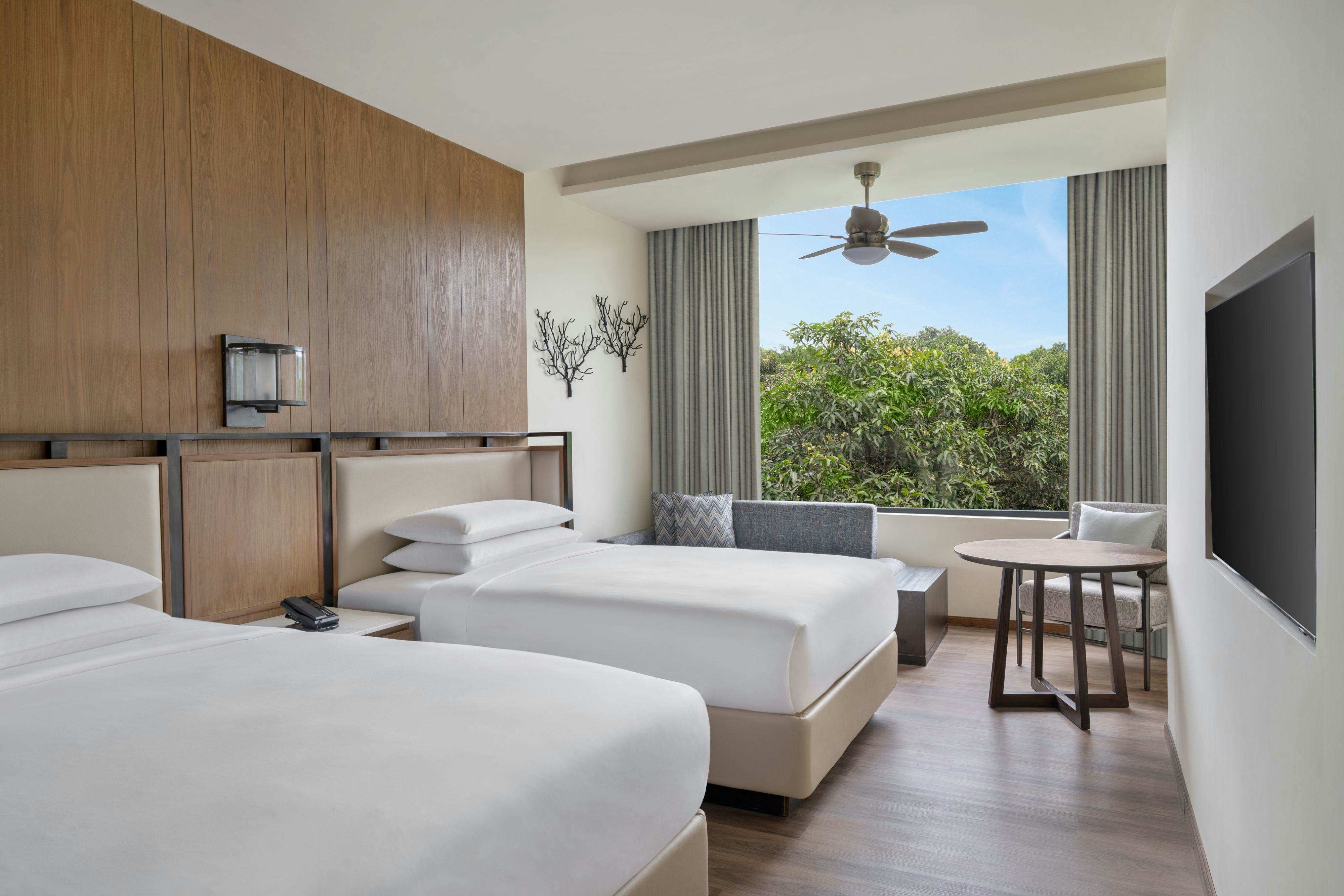 Jim Corbett Marriott Resort and Spa-guestroom-Deluxe Twin.jpg