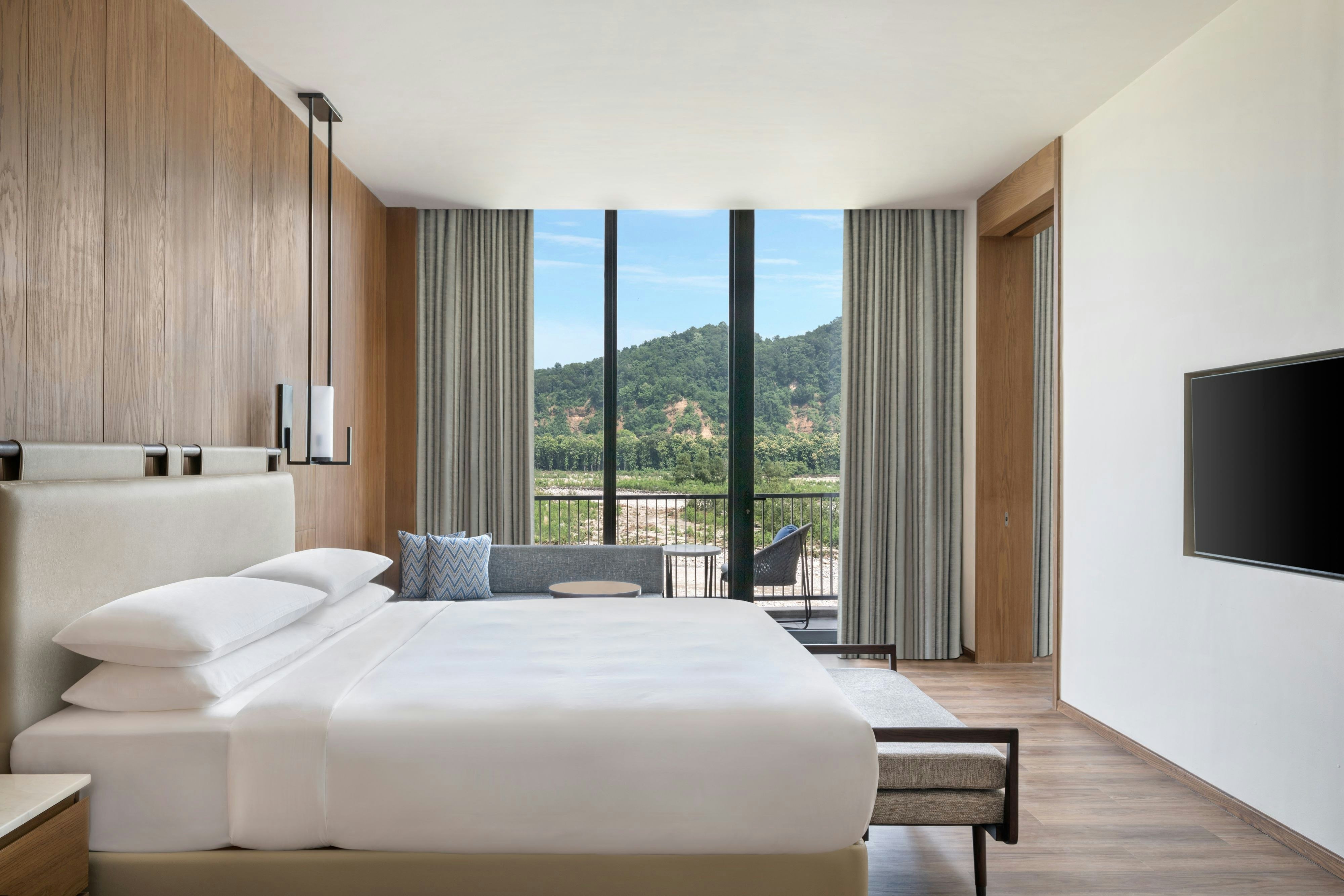 Jim Corbett Marriott Resort and Spa-guestroom-Executive Suite, River View.jpg