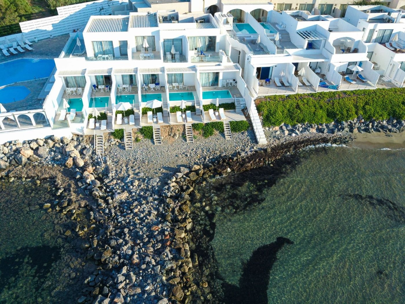 Knossos Beach Resort-guestroom-Knossos Beach Island Suite Waterfront.jpg