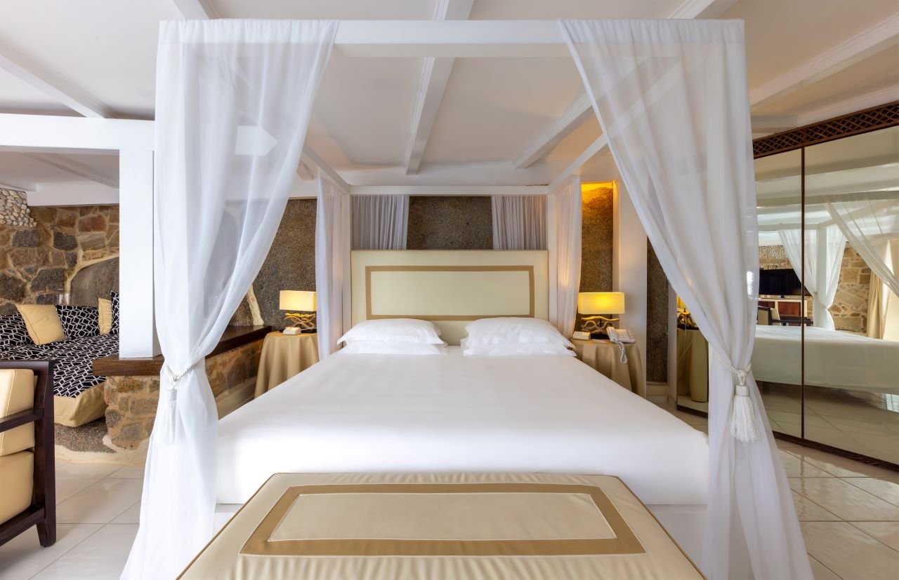 Hotel and Spa Des Pecheurs-guestroom-Grande Suite - Bedroom.jpg