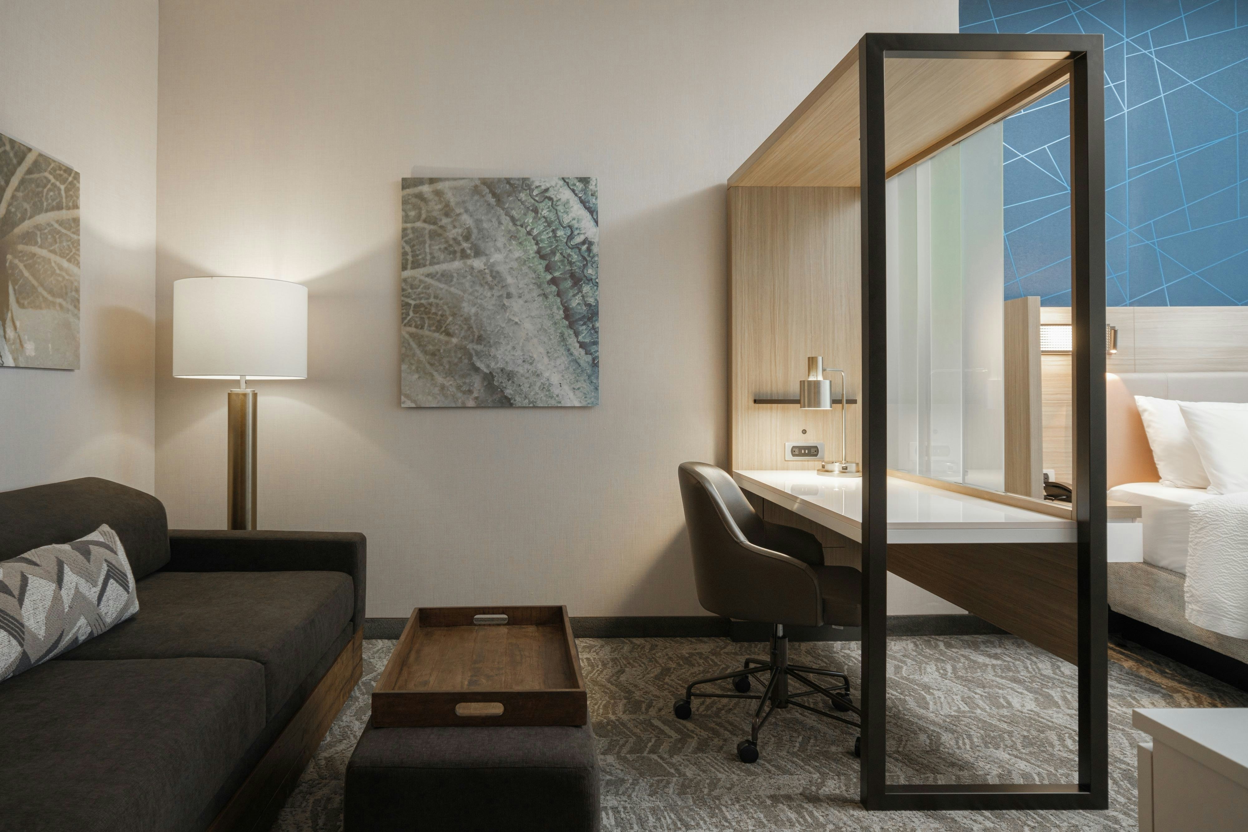 SpringHill Suites by Marriott Lexington Frankfort-guestroom-Suite Seating Area.jpg