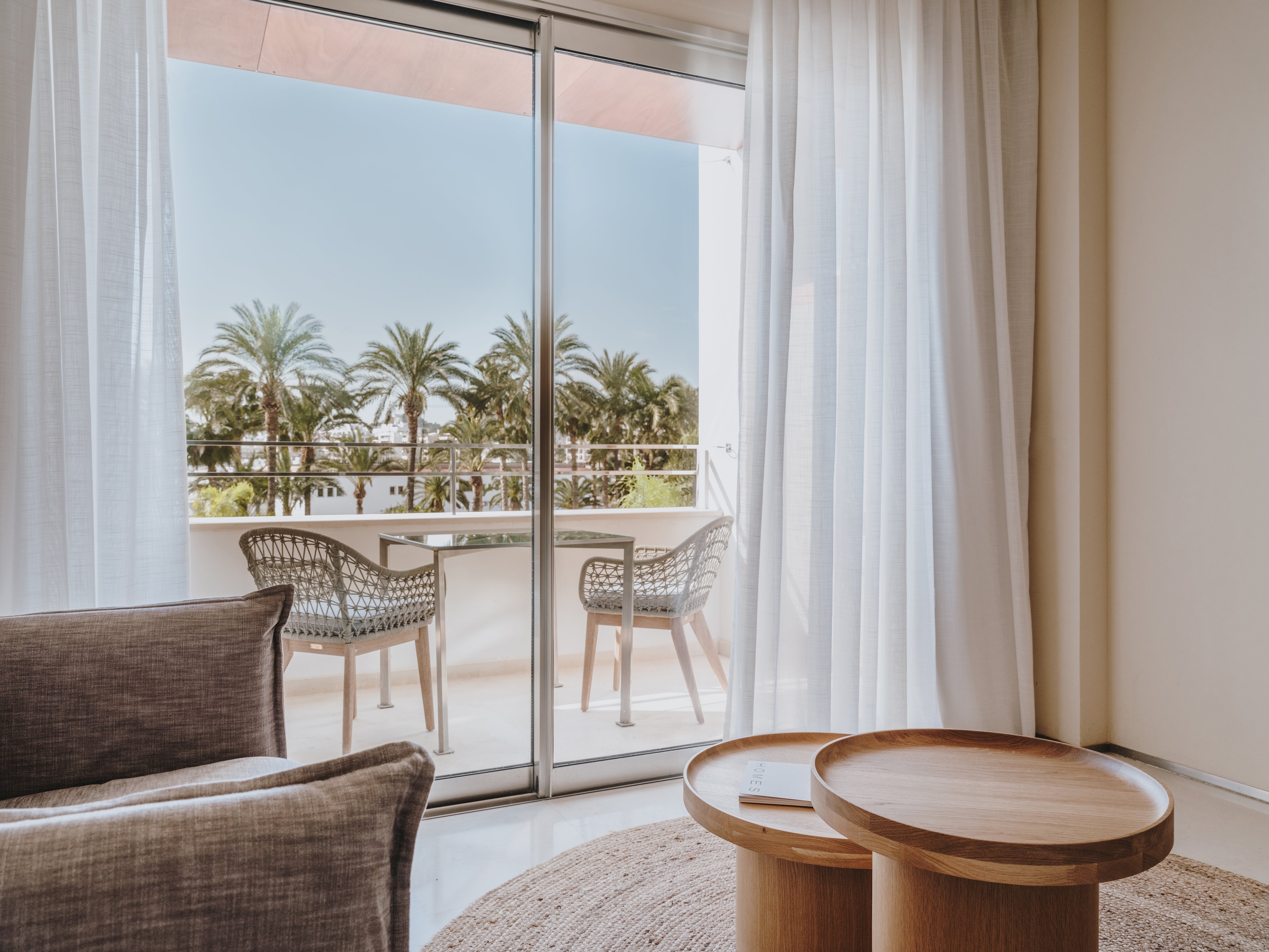 AGUAS DE IBIZA GRAND LUXE HOTE-guestroom-Deluxe - Living Area.jpg