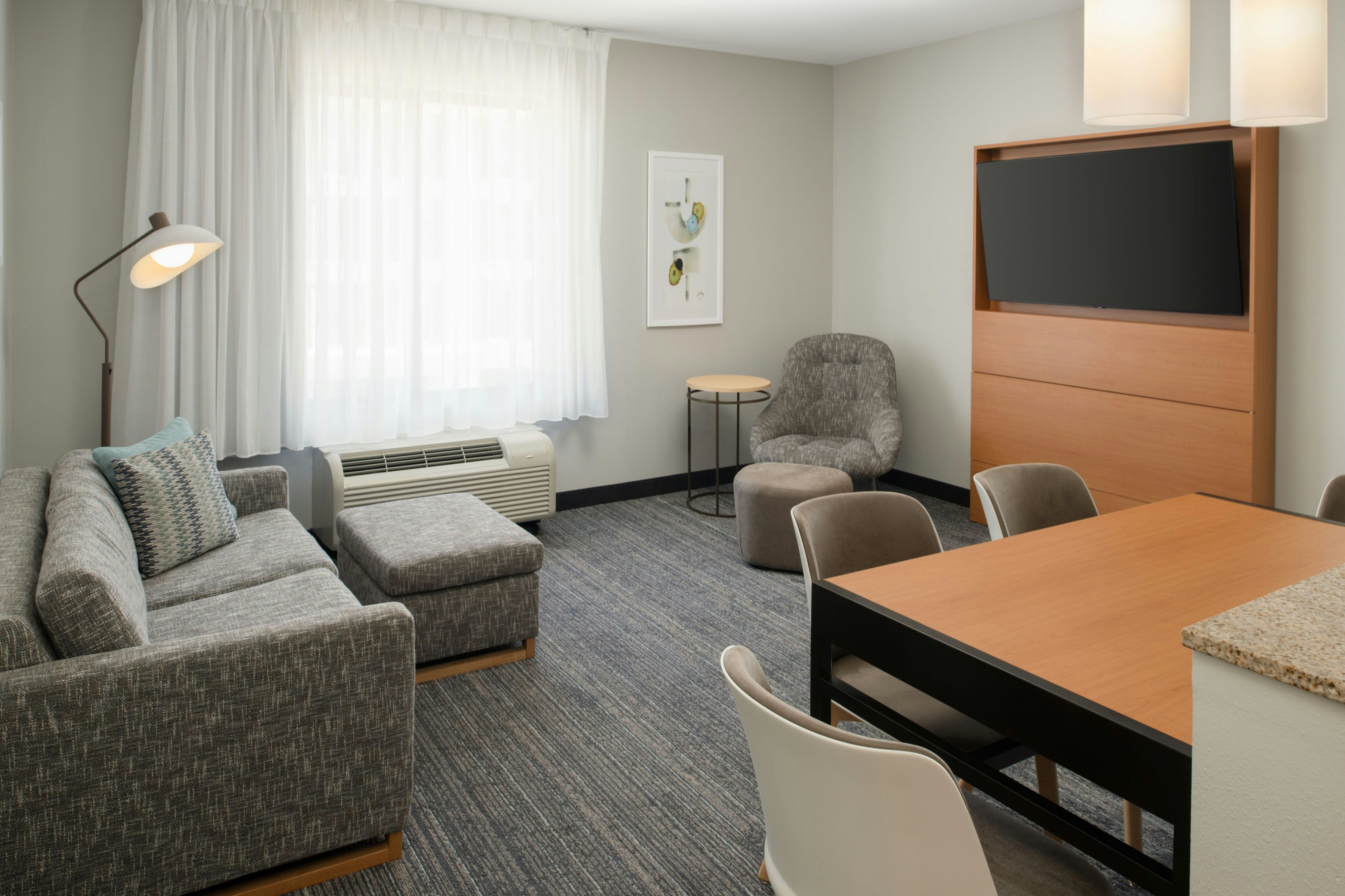 TownePlace Suites by Marriott Jackson Ridgeland Township at Colony Park-guestroom-Two-Bedroom Suite - Living Room.jpg