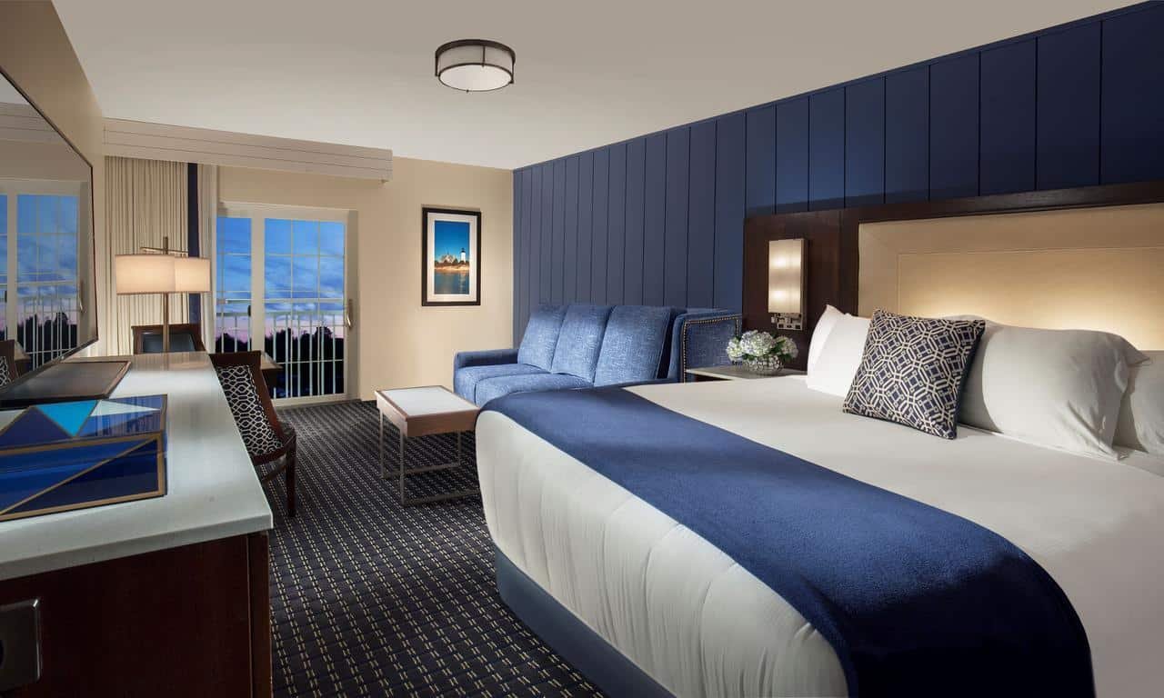 Hyannis Harbor Hotel-guestroom-King with Queen Sleeper Sofa - Harborside Tower.jpg