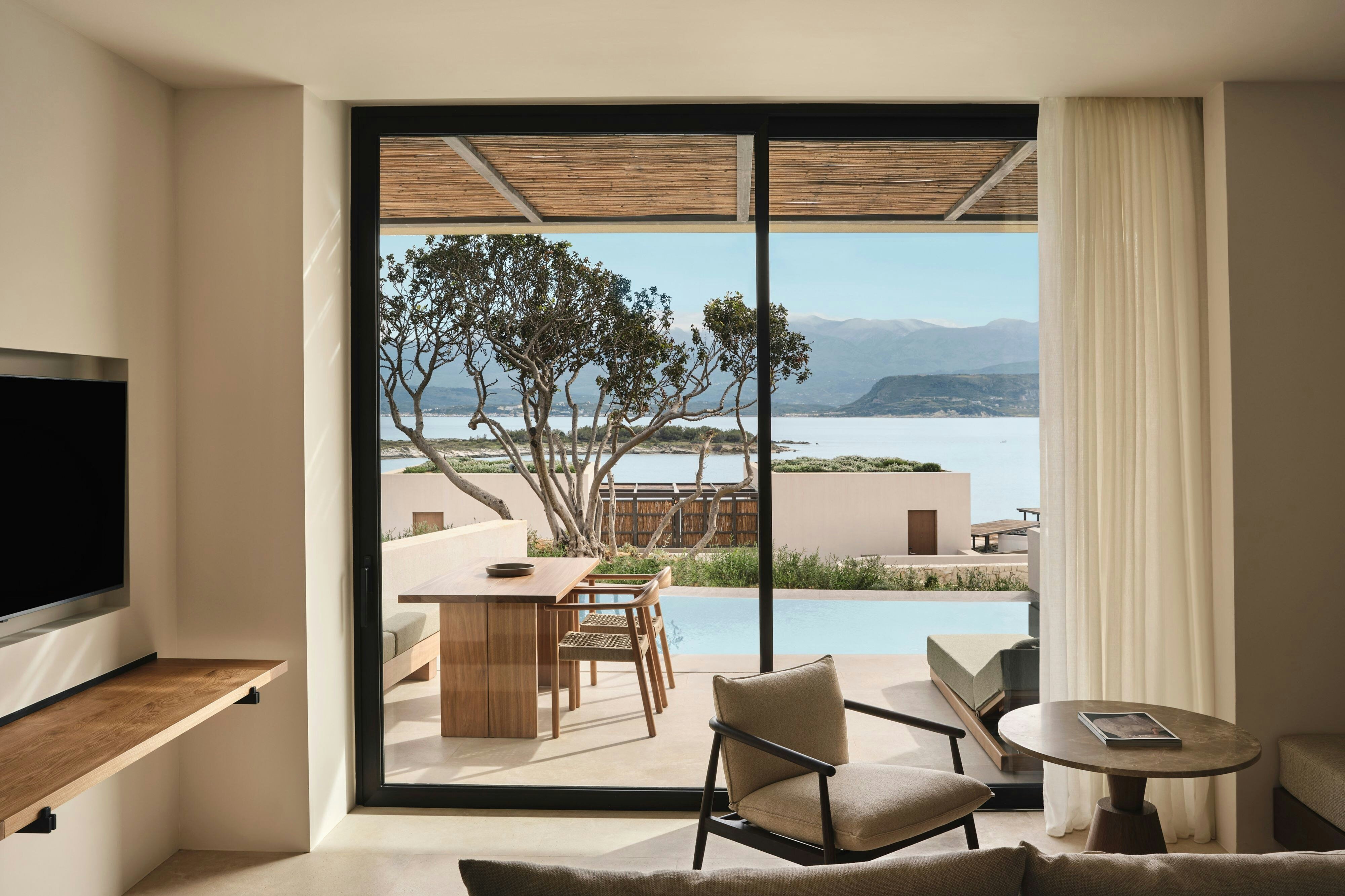 JW Marriott Crete Resort and Spa-guestroom-Deluxe Suite Living Room.jpg