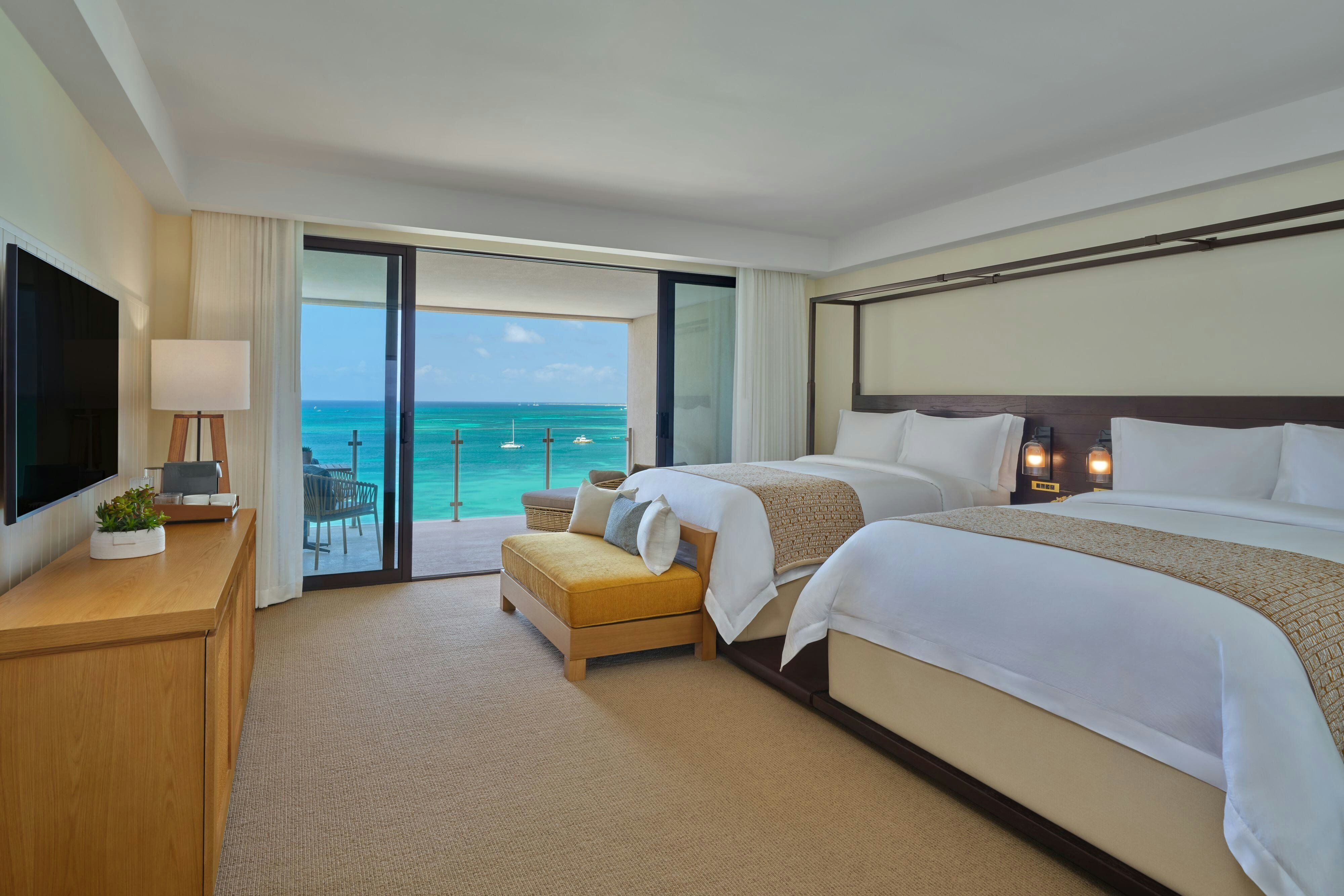 The St Regis Aruba Resort-guestroom-Deluxe Double Queen Oceanfront Bedroom.jpg