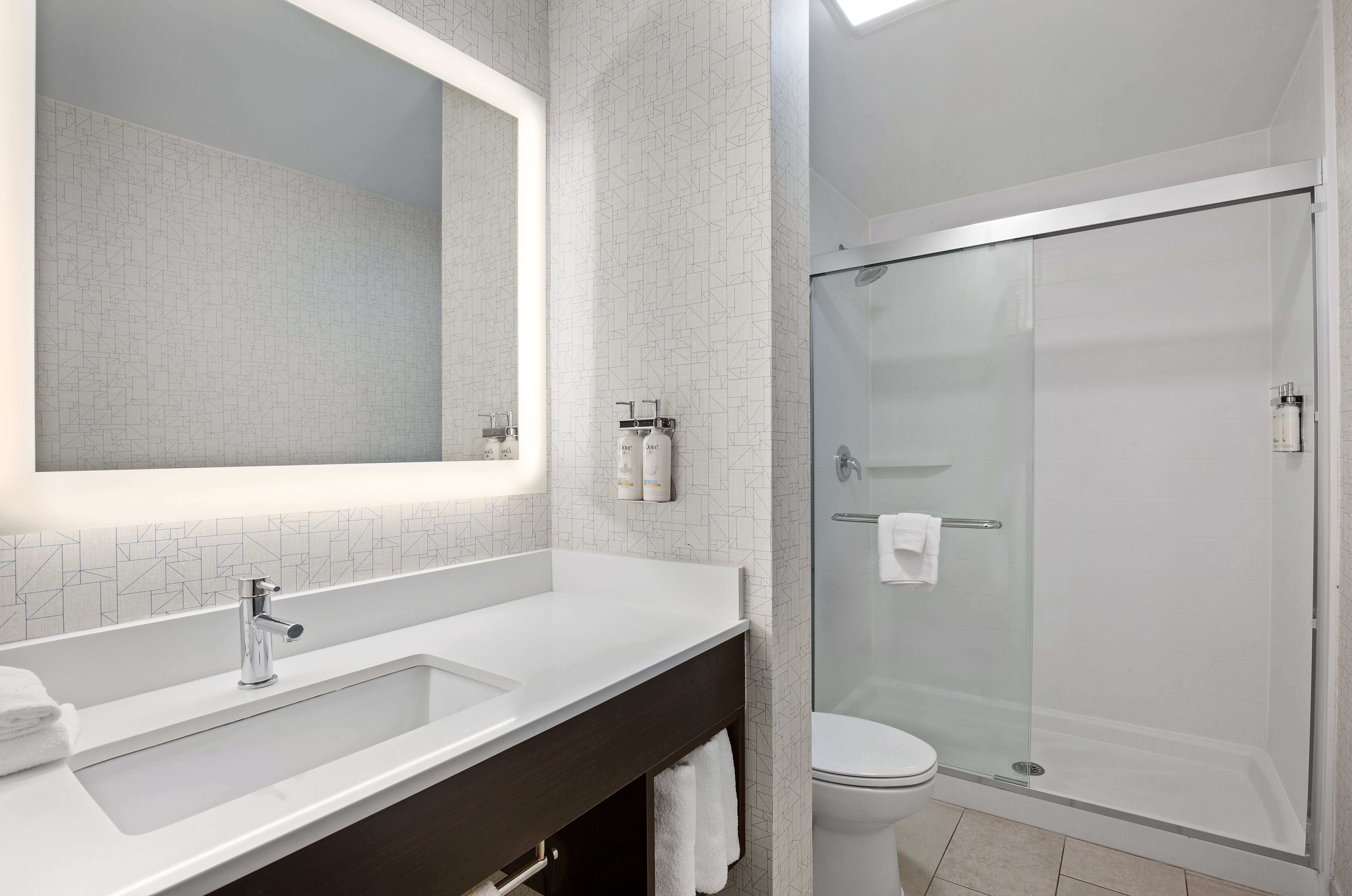 HOLIDAY INN EXP STES LOCUST GROVE B-guestroom-Revitalize with our bath amenities during your stay..jpg
