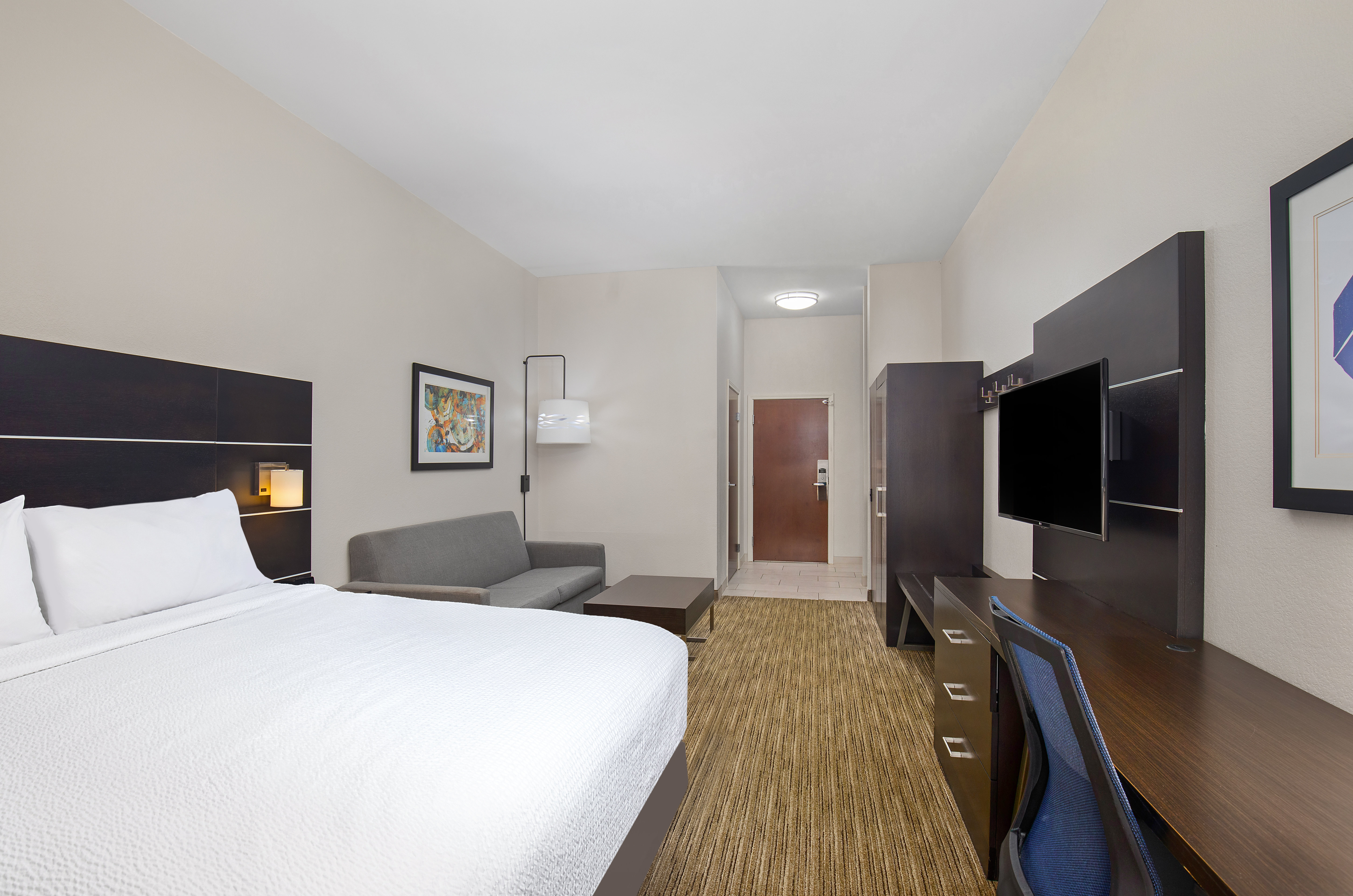 HOLIDAY INN EXP STES LOCUST GROVE B-guestroom-Suite.jpg