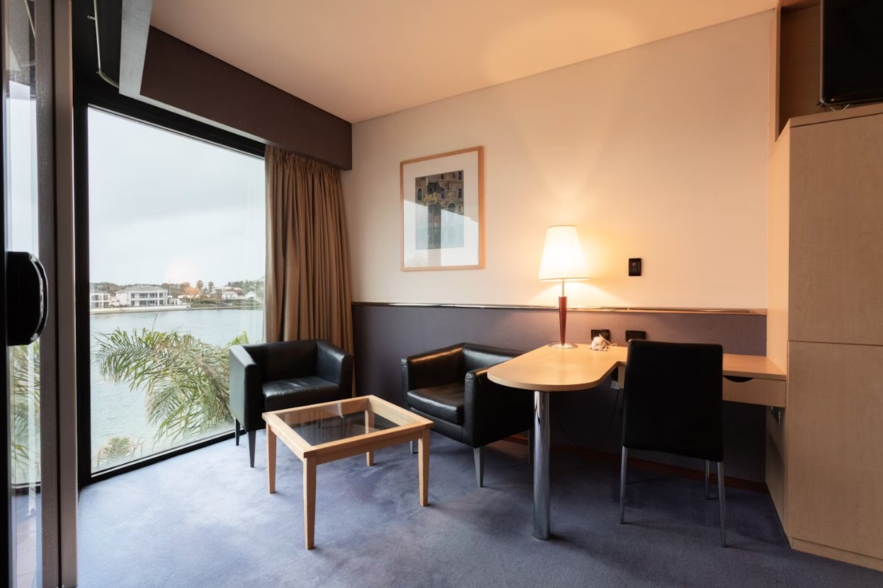 The Lakes Resort Hotel-guestroom-Executive Suite Sitting Area And Work Station.jpg