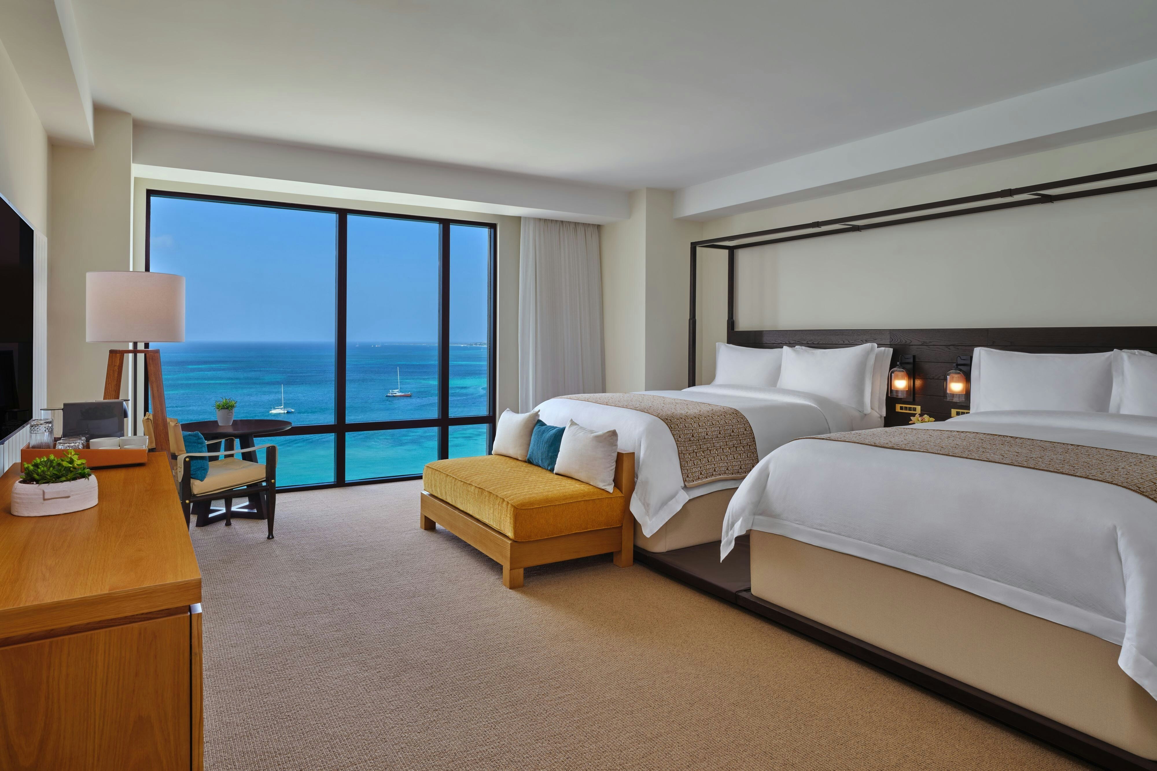 The St Regis Aruba Resort-guestroom-St. Regis Suite Double Queen Bedroom.jpg