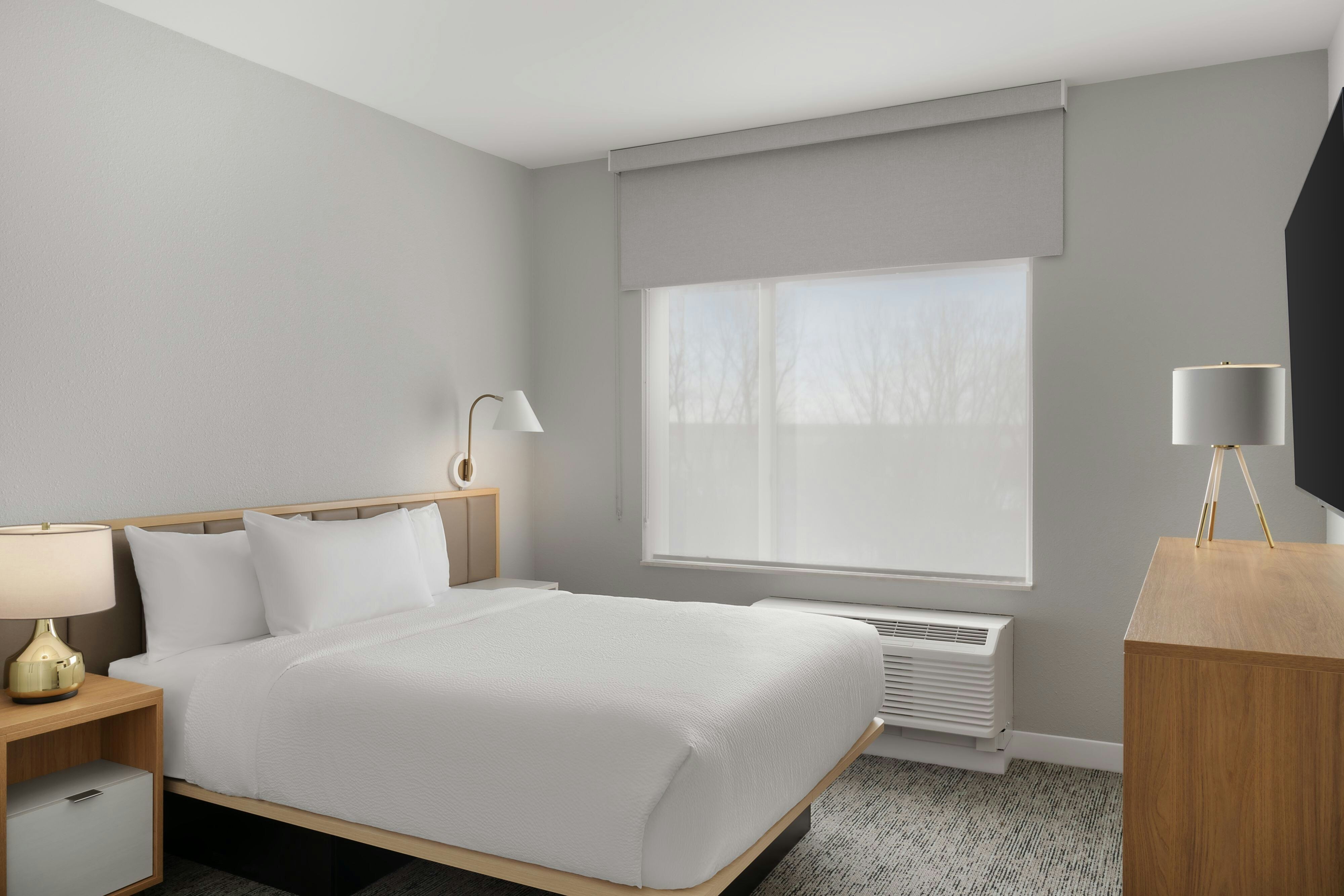 TownePlace Suites by Marriott Crown Point-guestroom-One-Bedroom Suite Bedroom.jpg