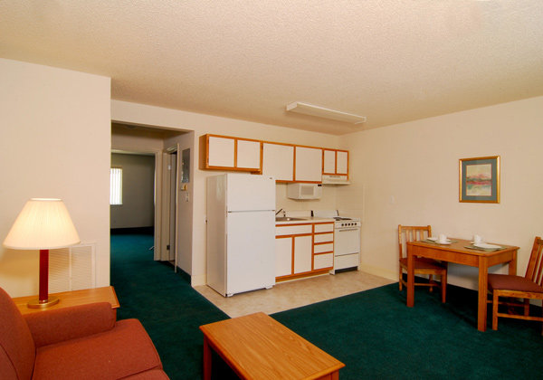 Affordable Suites of America --guestroom-Guest room.jpg